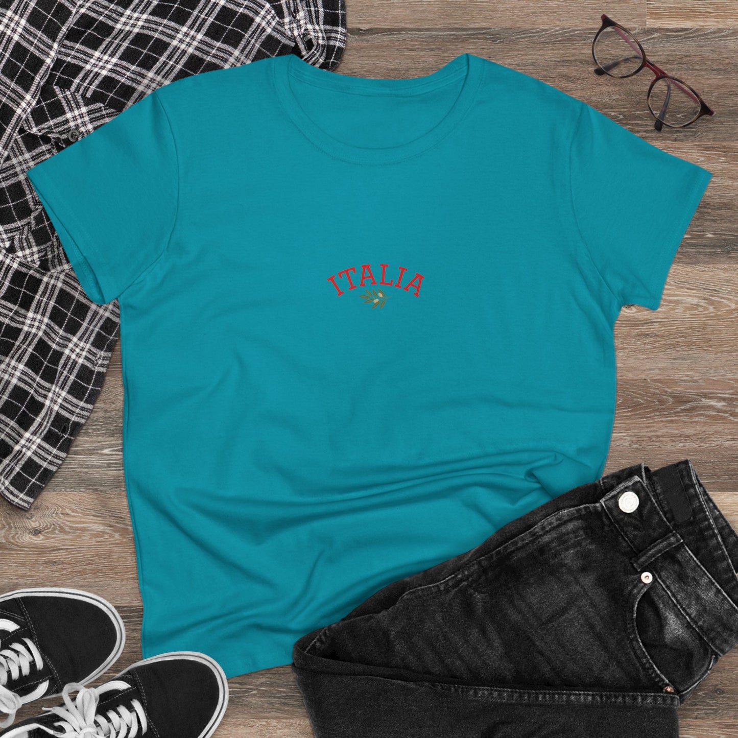 Casual flat lay of a turquoise Unisex Ultra Cotton Tee with Italian Heritage Design, featuring 'ITALIA' in red lettering, paired with denim and casual shoes, perfect for adventure lovers.