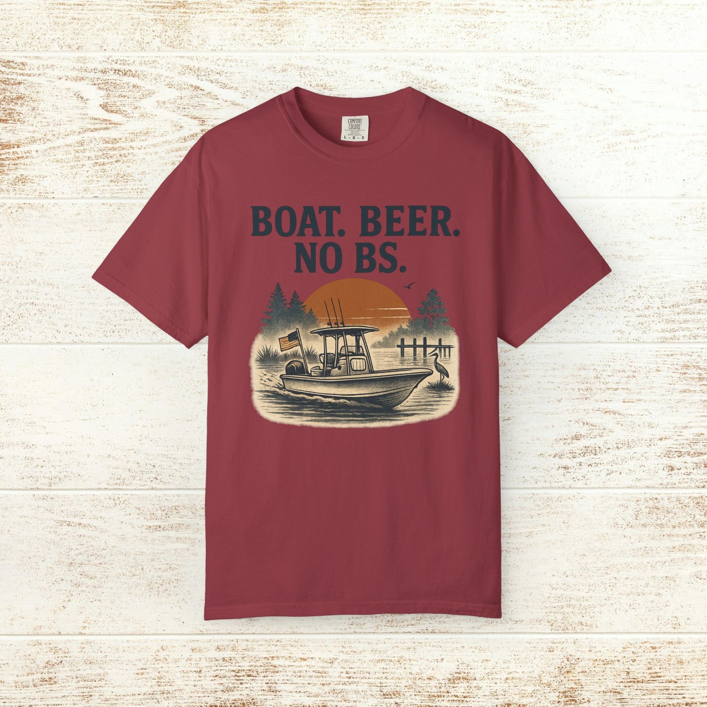 Boat Beer No BS Tee in maroon color with a graphic of a boat and sunset, promoting a laid-back lifestyle.