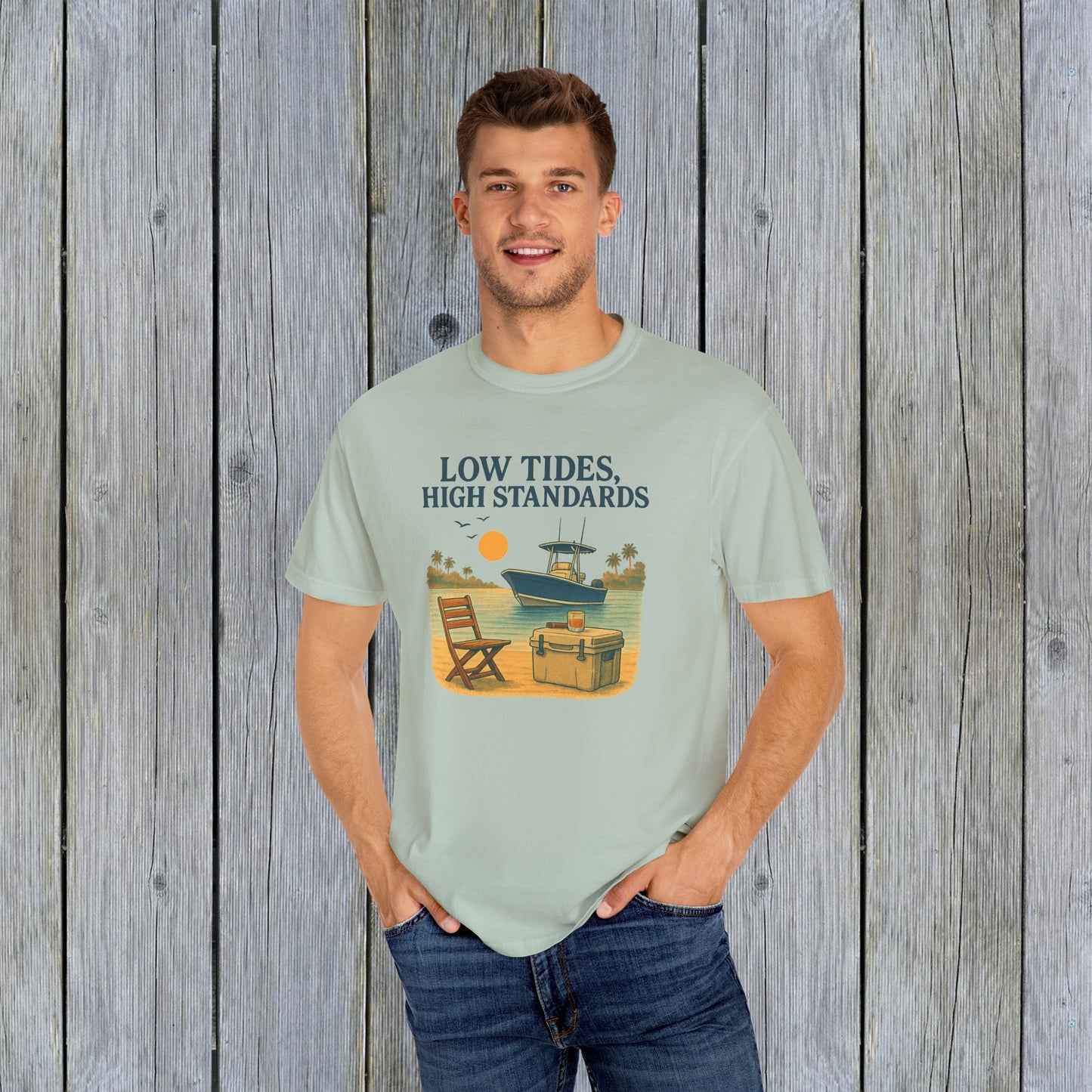 Garment-Dyed Low Tides High Standards T-Shirt modeled in a relaxed setting, showcasing its comfortable fit and beach-inspired graphics for a trendy casual look.