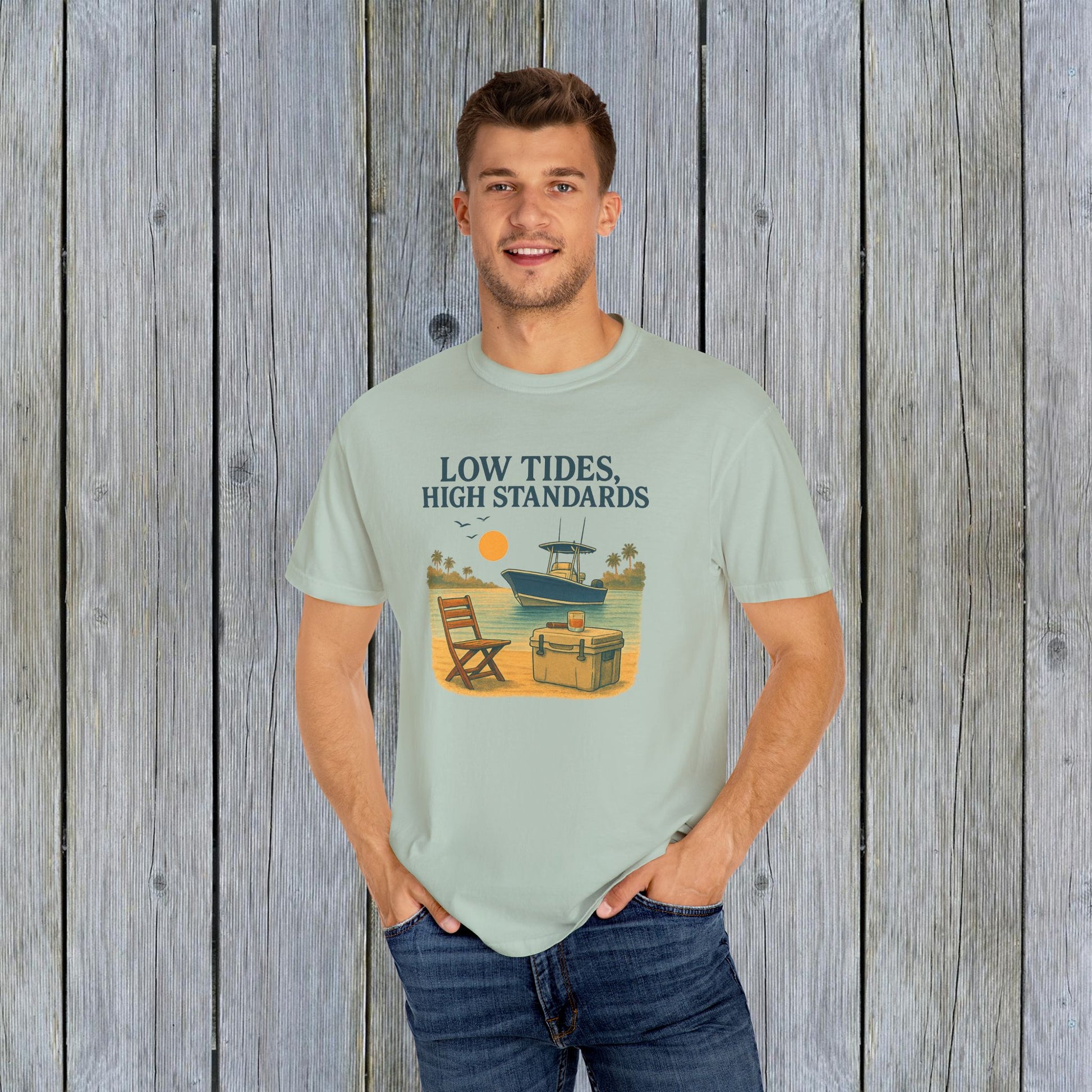 Garment-Dyed Low Tides High Standards T-Shirt modeled in a relaxed setting, showcasing its comfortable fit and beach-inspired graphics for a trendy casual look.