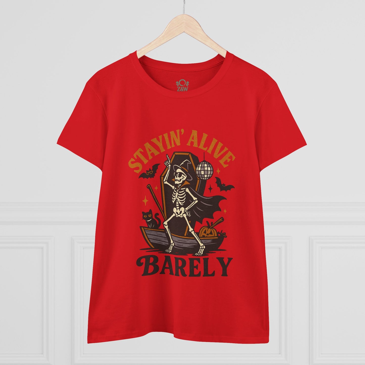 Red Stayin’ Alive T-Shirt displayed on a hanger, featuring a whimsical skeleton design for Halloween festivities.
