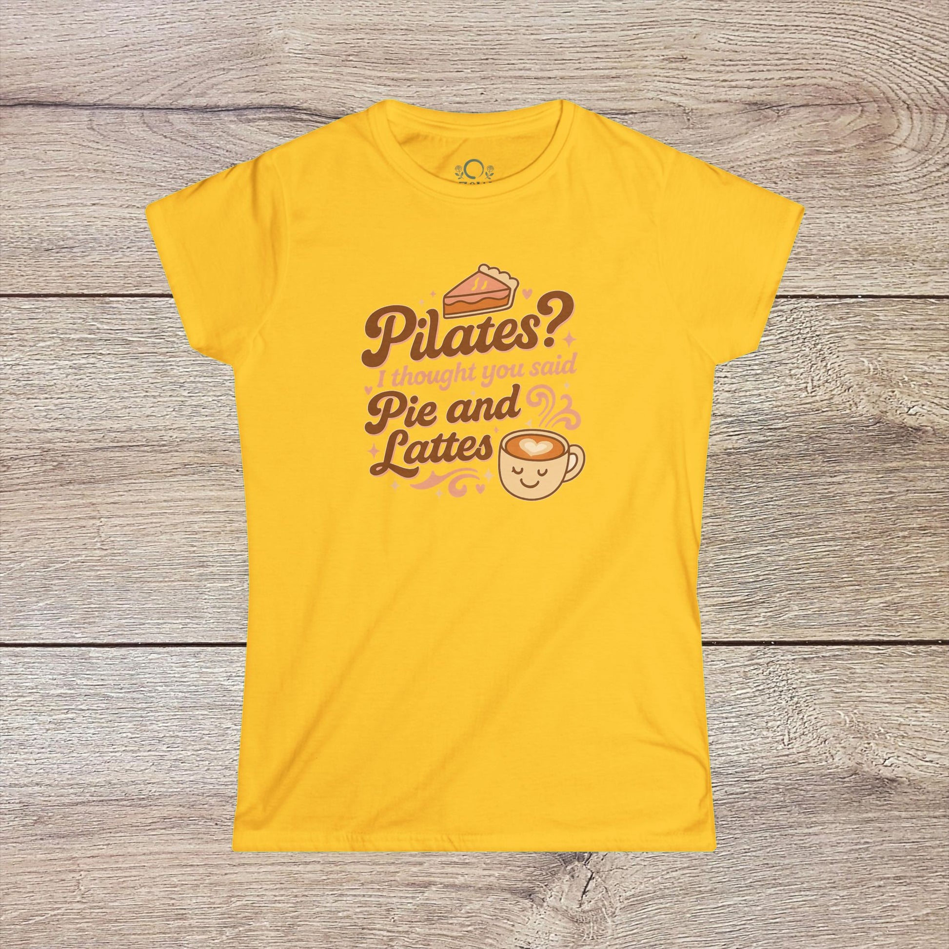 Funny Pilates T-Shirt with Durable Shoulder Tape and Classic Fit for Everyday Comfort in yellow, featuring a playful graphic that combines Pilates with pie and lattes.