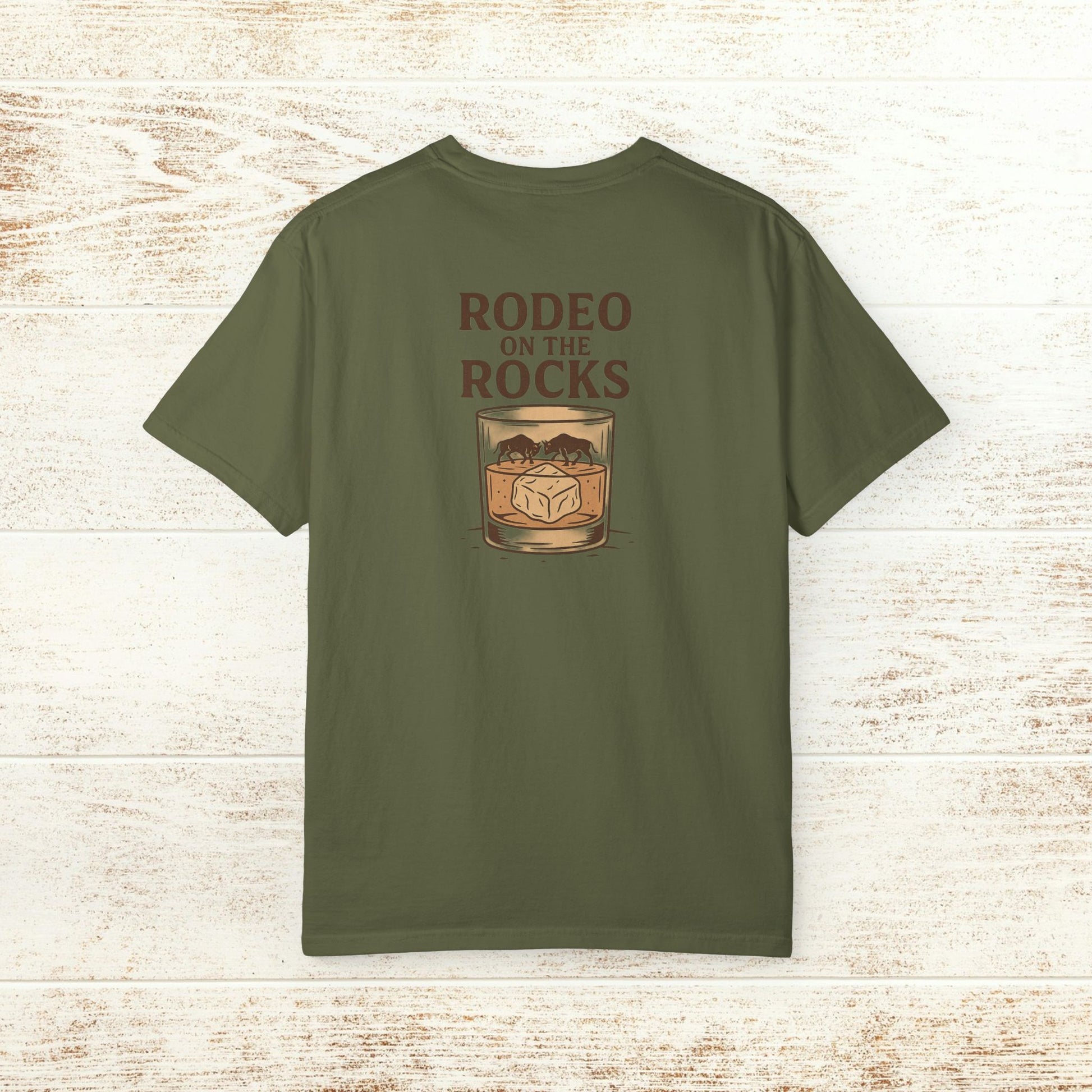 Back view of the Rodeo On The Rocks Tee in olive green, showcasing the stylish print with 'RODEO ON THE ROCKS', a great addition to your casual collection.