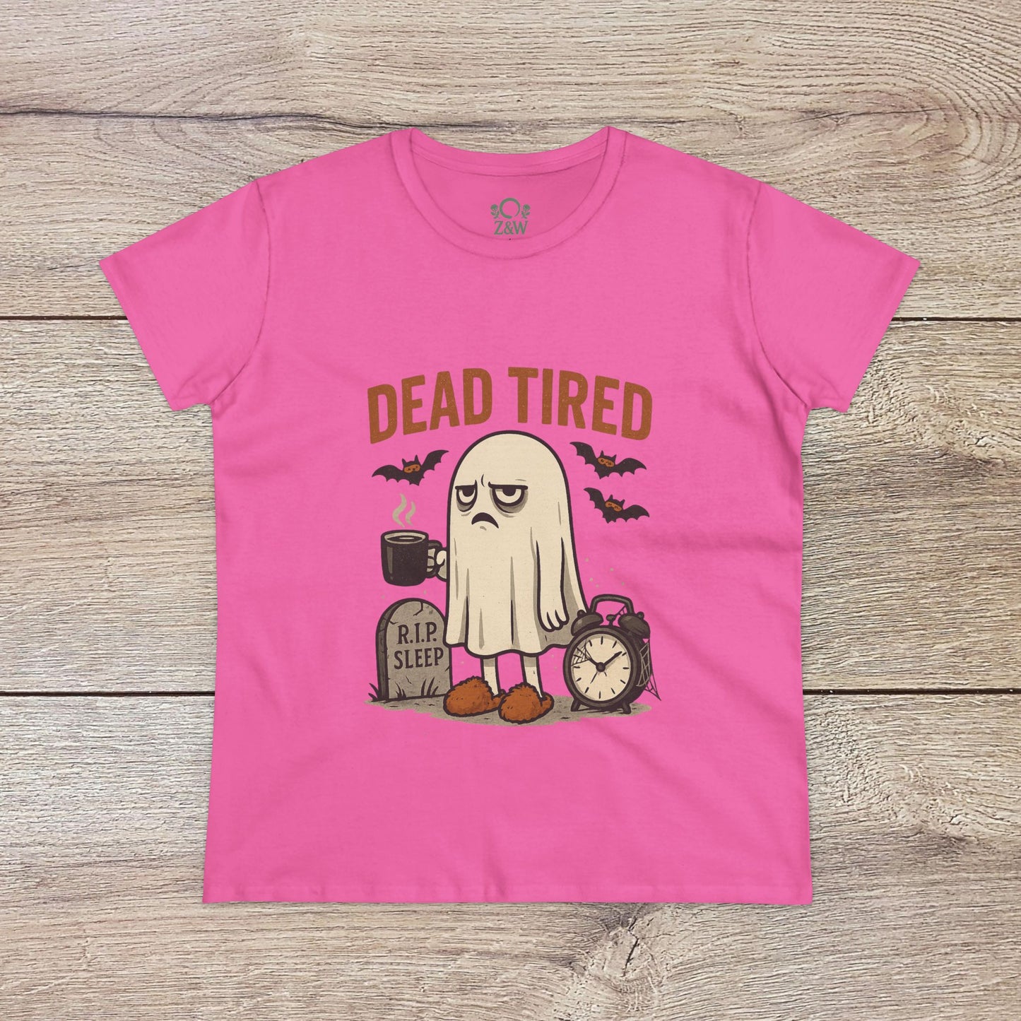 Cute Whimsical Ghost T-Shirt for Halloween in bright pink, highlighting a 'DEAD TIRED' design with a ghost and an alarm clock, made from 100% cozy cotton for lounging.