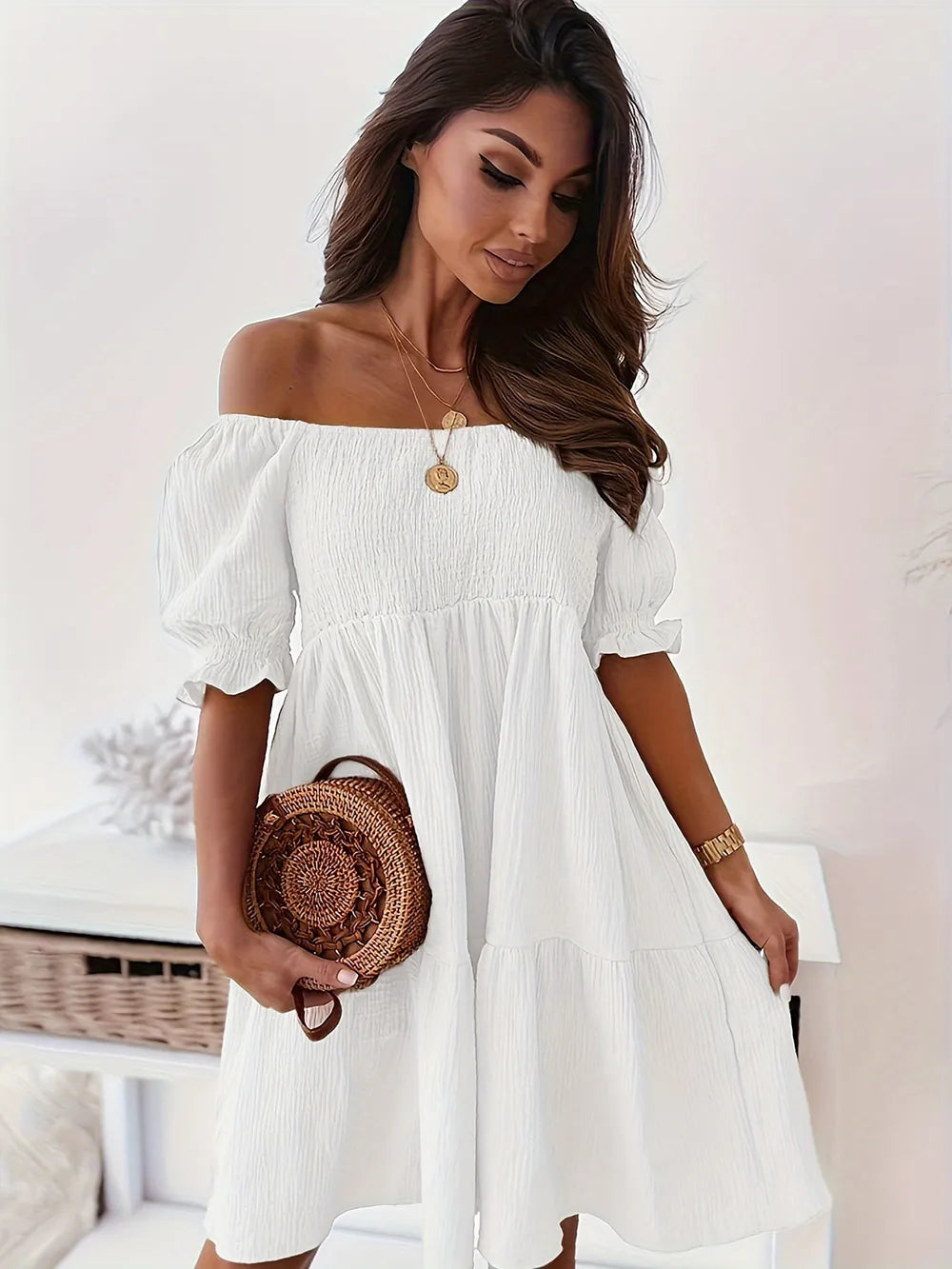 Elegant look at the Full Size Ruffled Off-Shoulder Dress with Short Sleeves - Stretchy, Chic & Ruched Design, featuring a model in a posed position that highlights the dress's flattering cut.