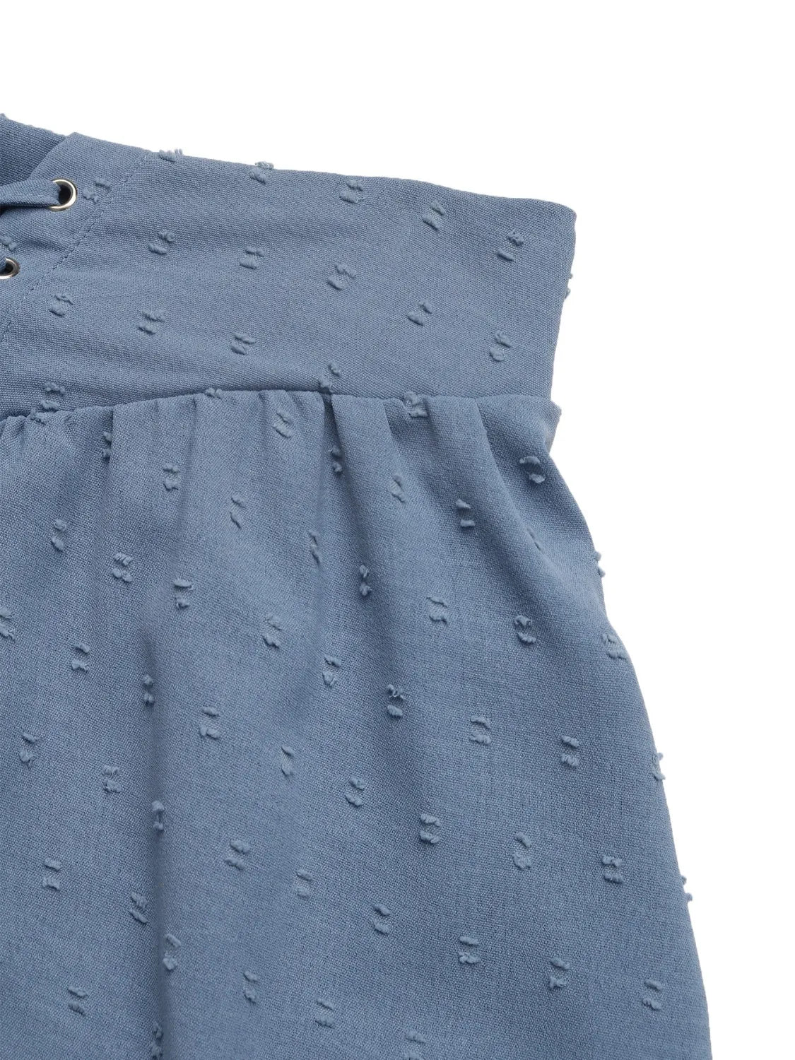 Swiss Dot Lace Up Shorts - Side angle highlighting fabric draping and design features.