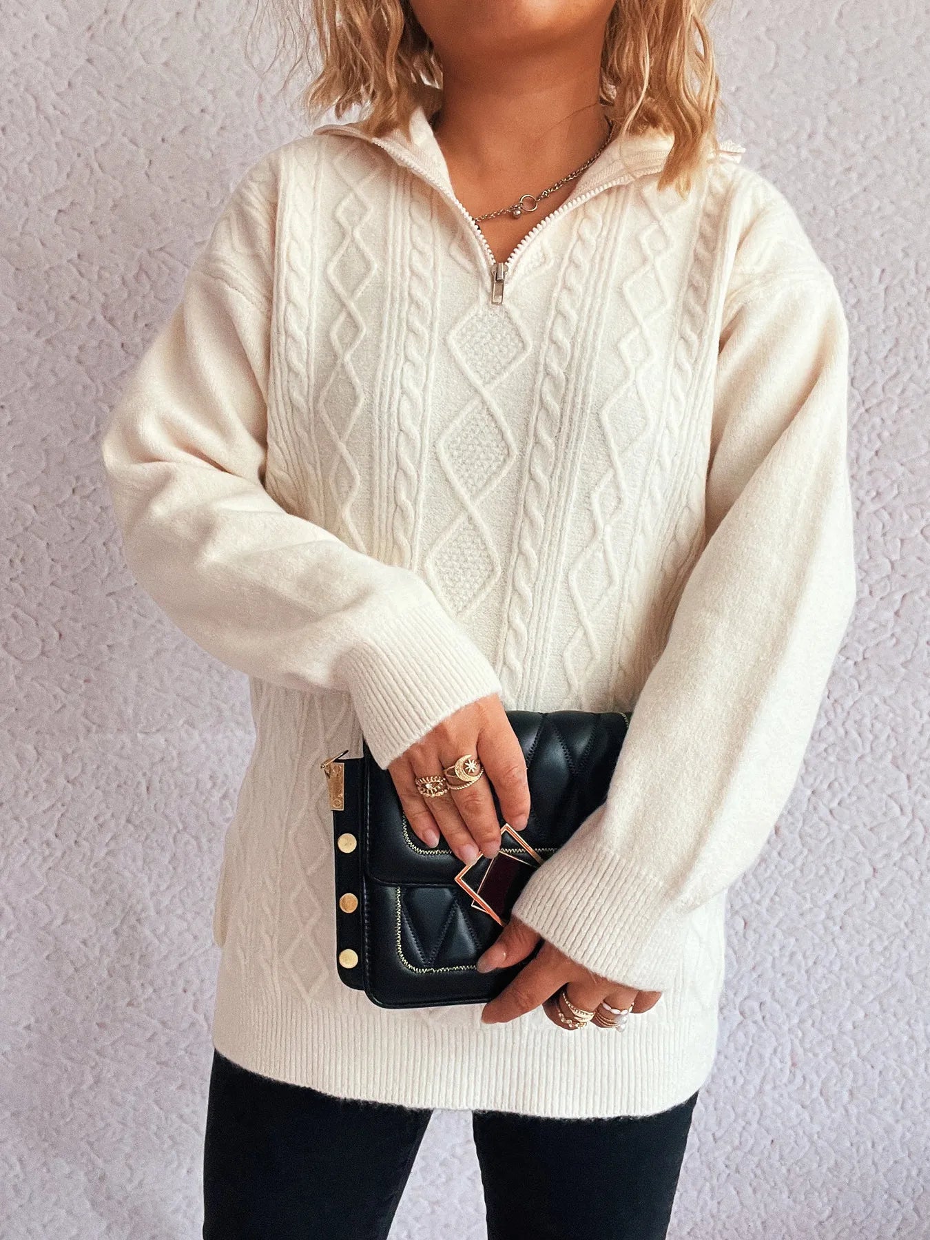 Cozy Cable-Knit Texture Zip Collar Long Sleeve Sweater in white, modeled with a black handbag, showcasing stylish winter wear.