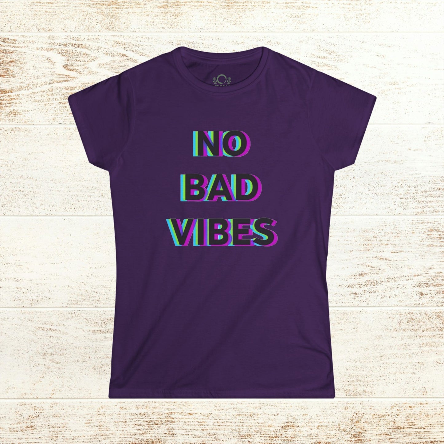 No Bad Vibes Tee displayed in a rich purple color, with eye-catching, vibrant lettering that promotes a positive vibe.