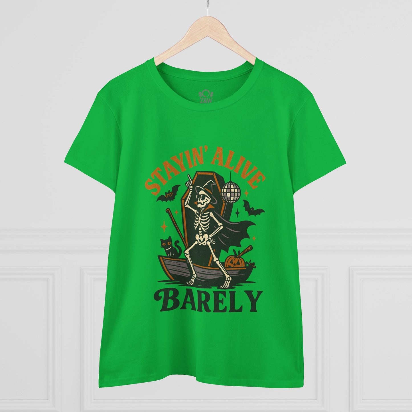 Stayin’ Alive T-Shirt featuring a playful skeleton design, perfect for Halloween celebrations. Bright green color enhances fun casual aesthetics.