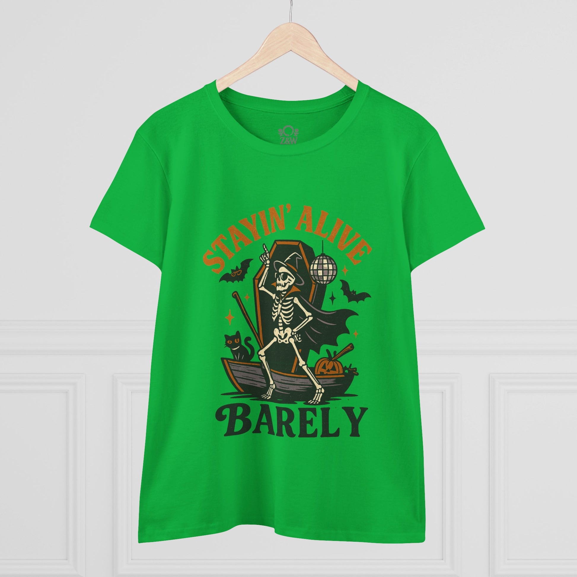 Stayin’ Alive T-Shirt featuring a playful skeleton design, perfect for Halloween celebrations. Bright green color enhances fun casual aesthetics.