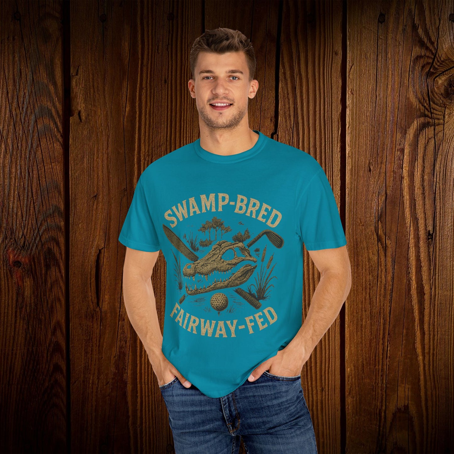 Model showcasing the Unisex Swamp-Bred Fairway-Fed Tee in vibrant turquoise, featuring a bold design suited for golf enthusiasts who appreciate style.