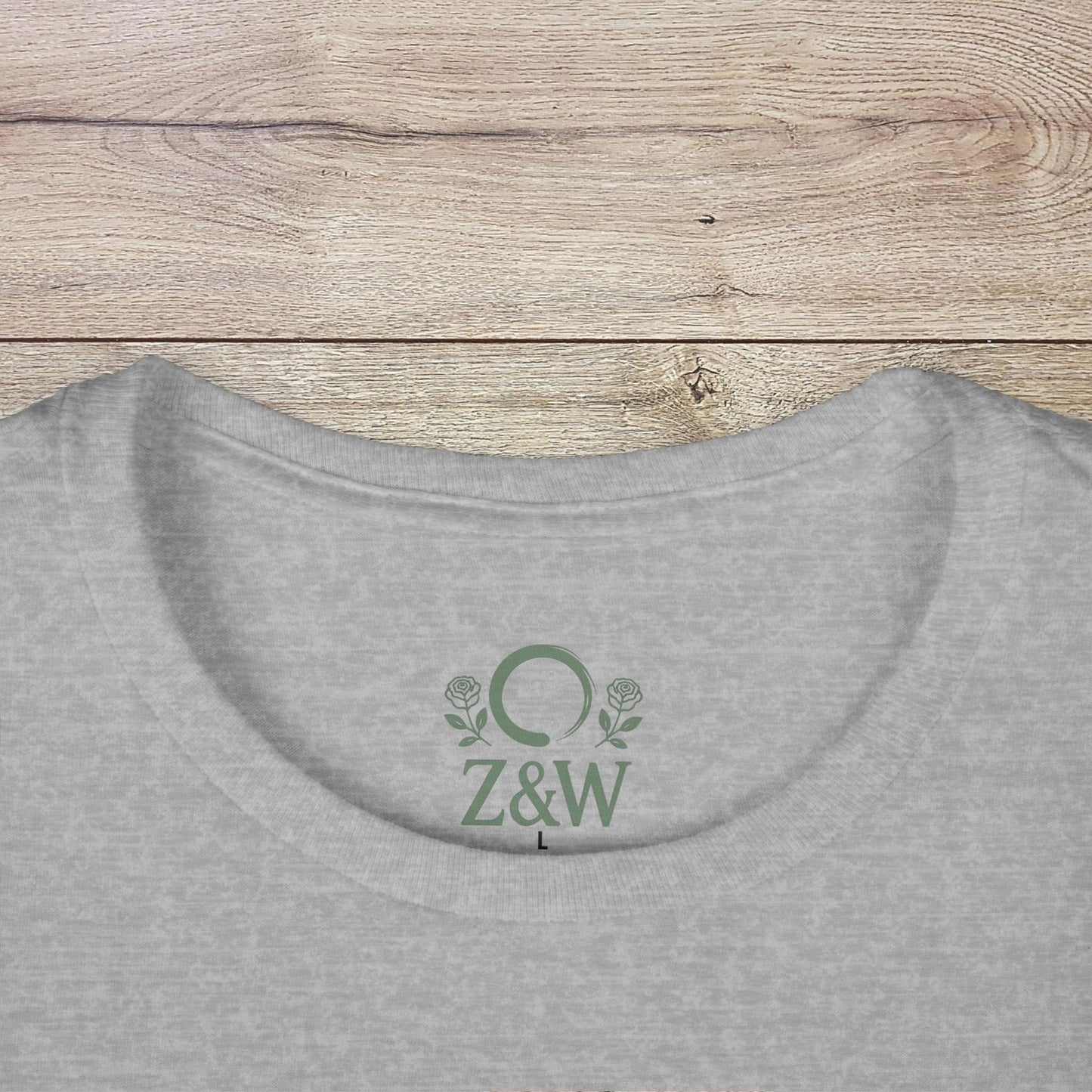 Eco-Friendly Dog T-Shirt - Adventure Spirit featuring a close-up of the neckline with Z&W logo on a gray fabric.