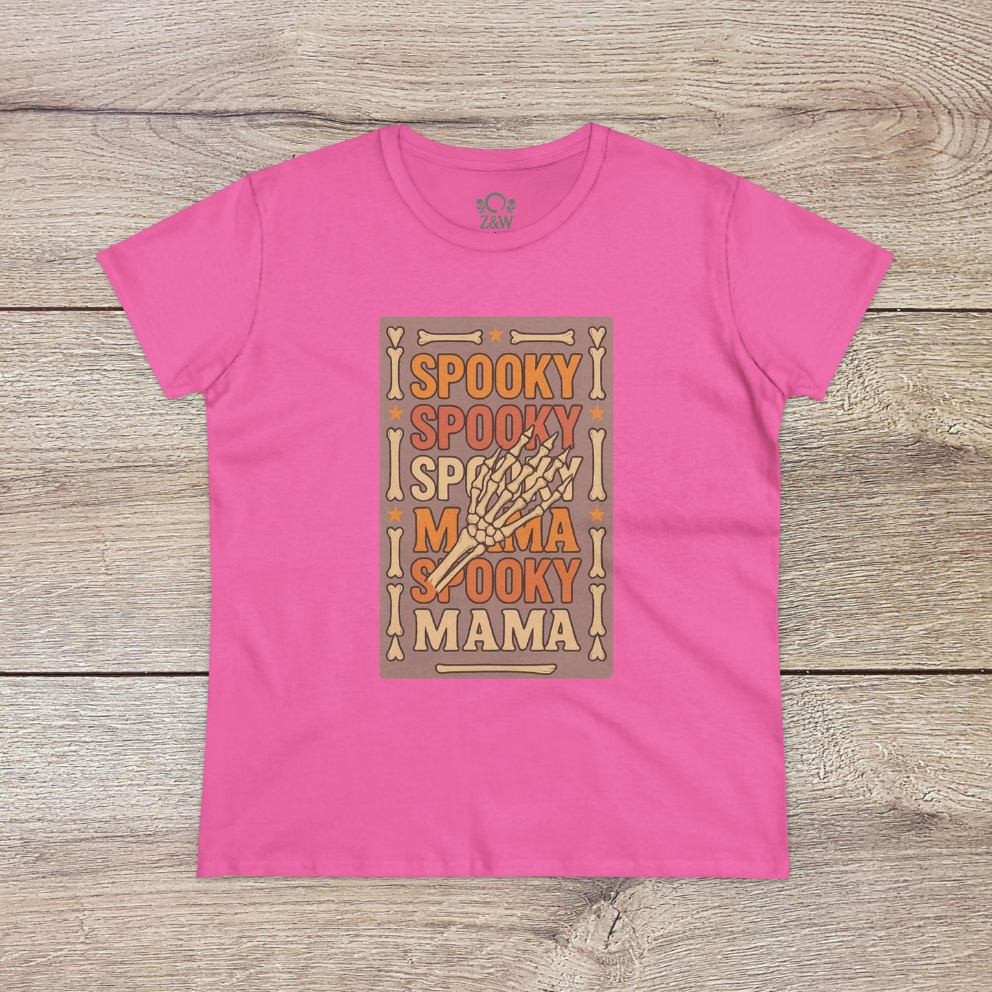 Spooky Mama Tee in vibrant pink featuring a quirky spine-chilling design of a skeleton hand, made from soft cotton for a classic fit.