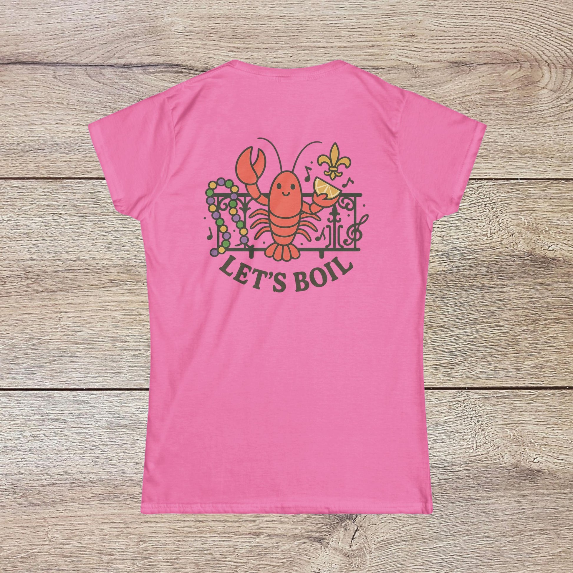 Crawfish Boil Shirt for Women showcasing a fun pink tee with a cartoon lobster design and the phrase 'LET'S BOIL' on the back, perfect for seafood enthusiasts attending summer festivals or NOLA celebrations.
