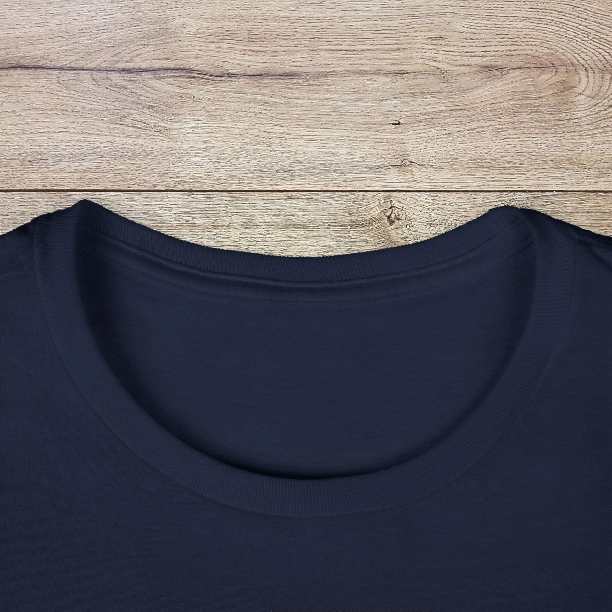Close-up of the neckline on the Golf Wives Social Club Tee in navy, featuring a stylish and comfortable ribbed knit collar designed to maintain its shape.