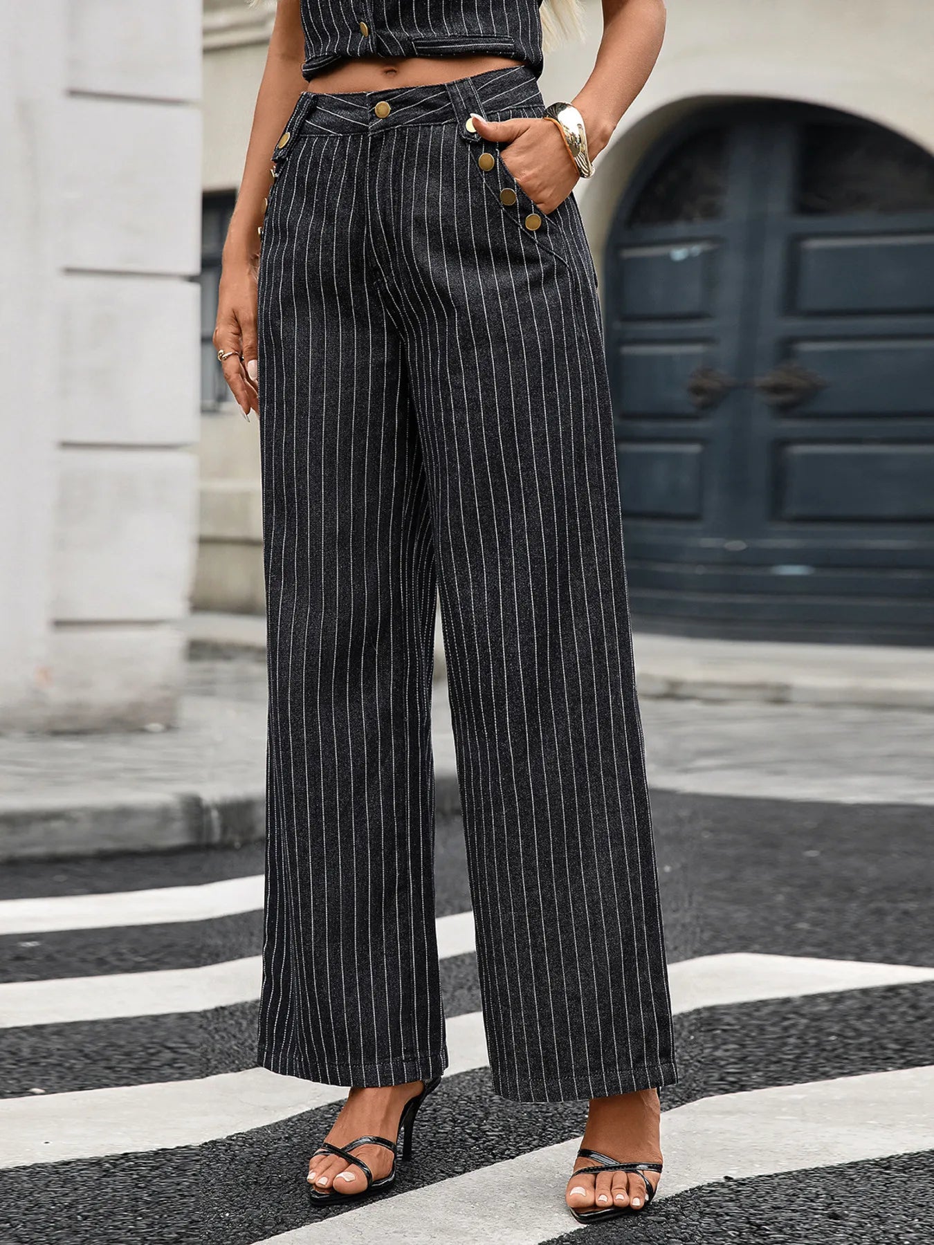 Detailed view of the Striped Button Down Tank and Pants Denim Set worn by a model, showcasing button details and striped design.