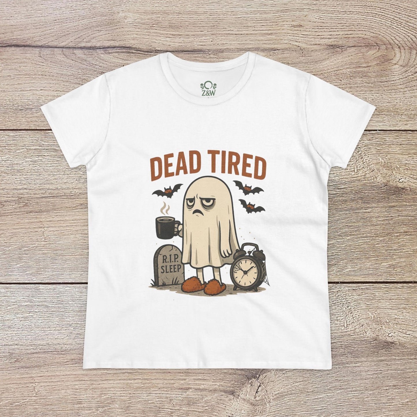 Cute Whimsical Ghost T-Shirt for Halloween displaying a 'Dead Tired' ghost graphic on a white shirt, crafted from soft 100% cotton for year-round casual wear.