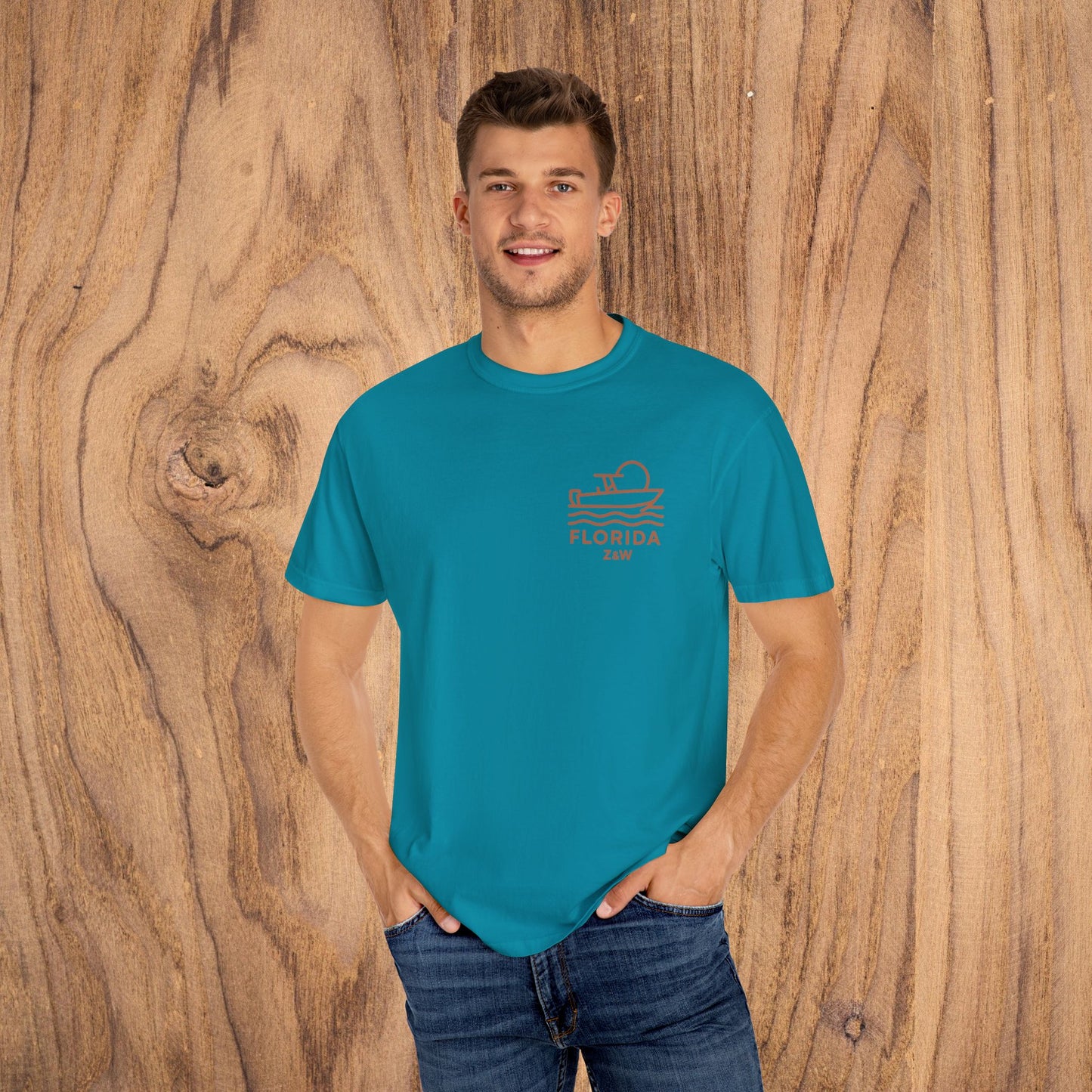 Man in teal Unisex Florida Graphic Tee, emphasizing comfort and style, ideal for casual wear.
