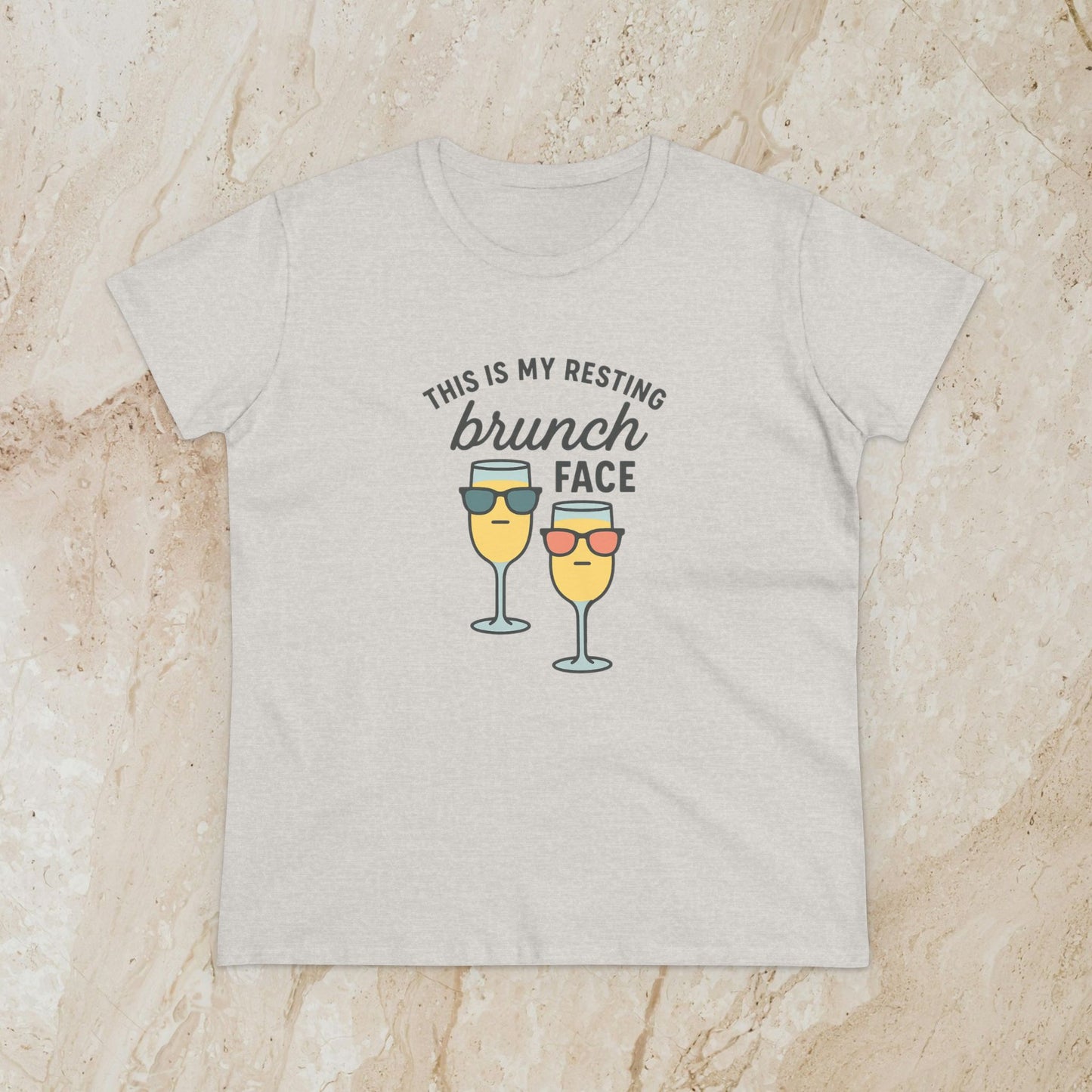 Women's Premium 100% Cotton Brunch Face Tee in grey showcasing a fun graphic of two sunglasses-clad cocktail glasses and the phrase 'THIS IS MY RESTING brunch FACE'. Perfect blend of comfort and style.