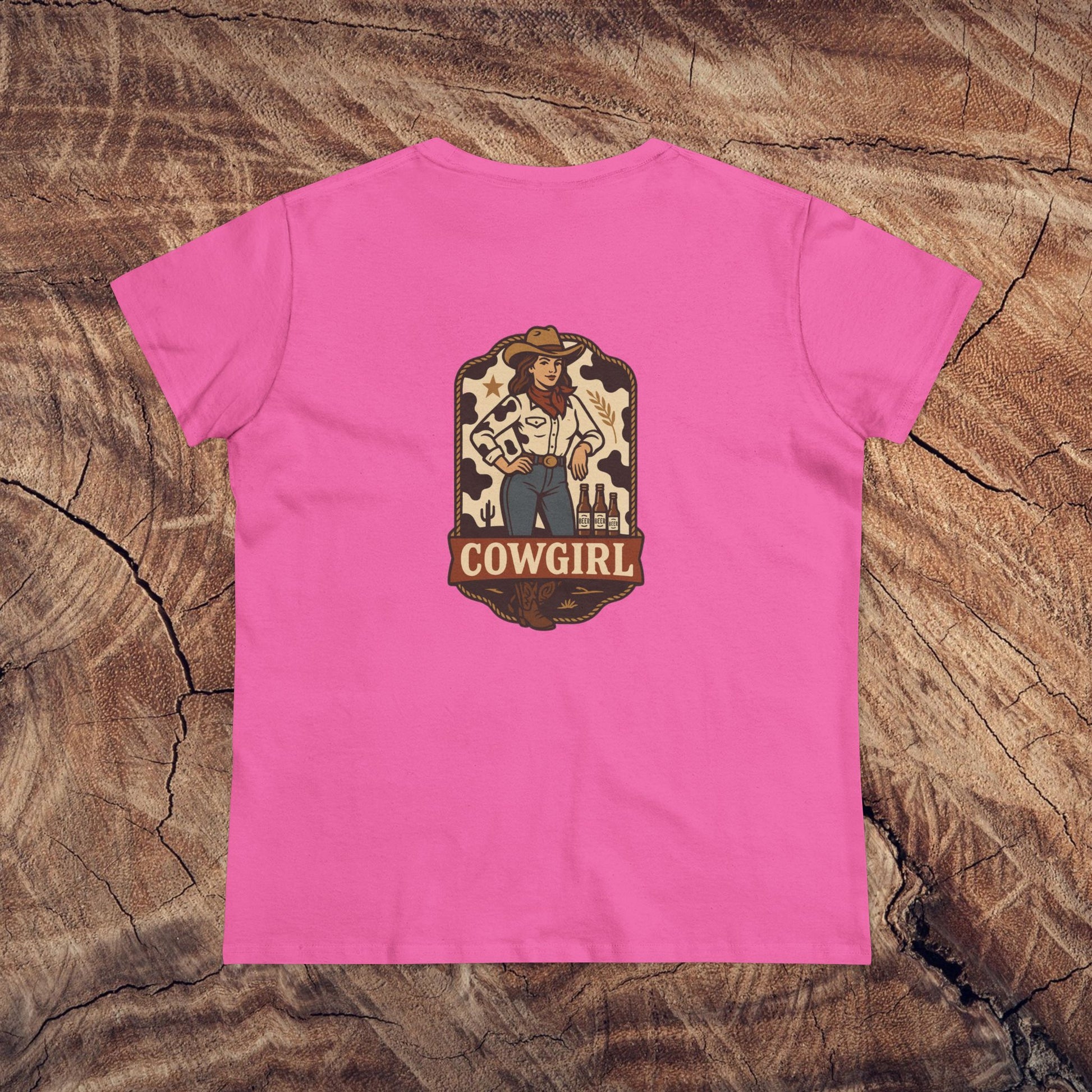 Country Roots Cowgirl Tee in vibrant pink with a stylish cowboy girl graphic on the back, made from 100% cotton, perfect for casual wear.