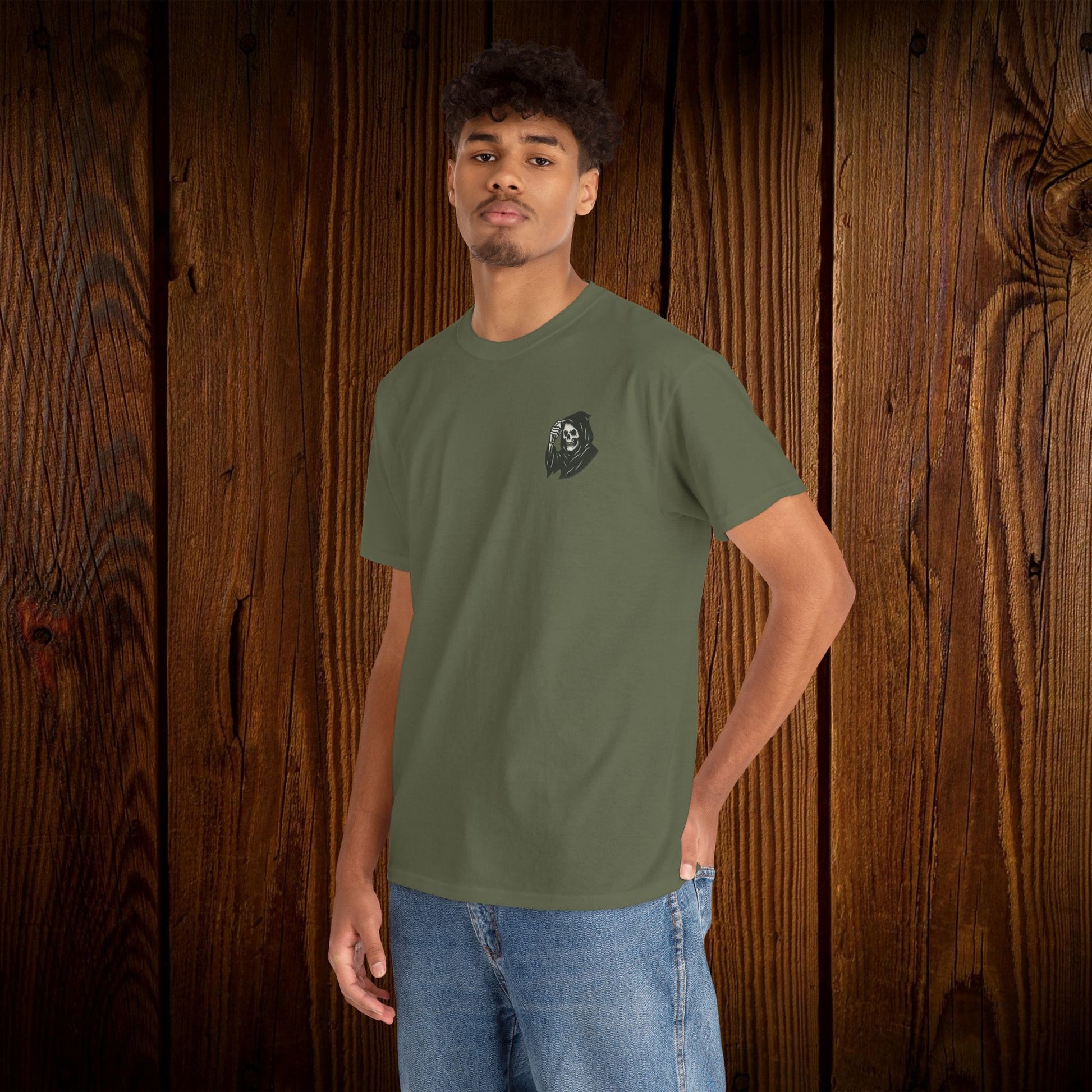 Spooky Halloween Graphic Tee - Unisex Cotton Shirt showcasing a detailed ghost graphic on the front, designed for Halloween celebrations, in a stylish green color.
