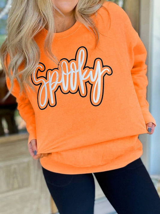 Chic Spooky Round Neck Long Sleeve Sweatshirt in vibrant orange, featuring a stylish 'Spooky' graphic, paired with black leggings, perfect for Halloween or casual wear. Made of a soft 65% polyester, 35% cotton blend for comfort.