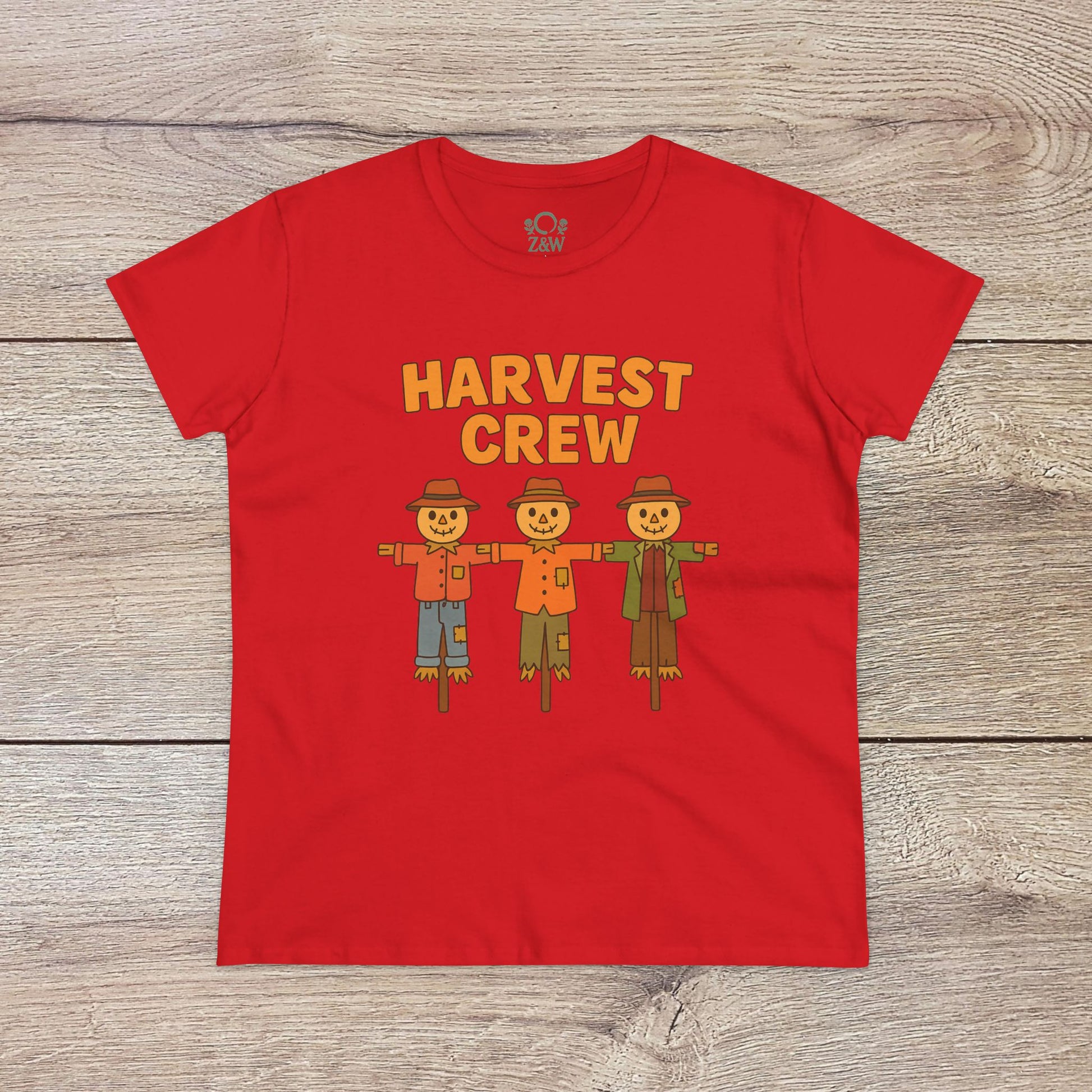 Harvest Crew Halloween T-Shirt in vibrant red with fun scarecrow designs and 'Harvest Crew' text. This tee is made from 100% ring-spun cotton, offering a classic fit that's both cozy and eco-conscious.