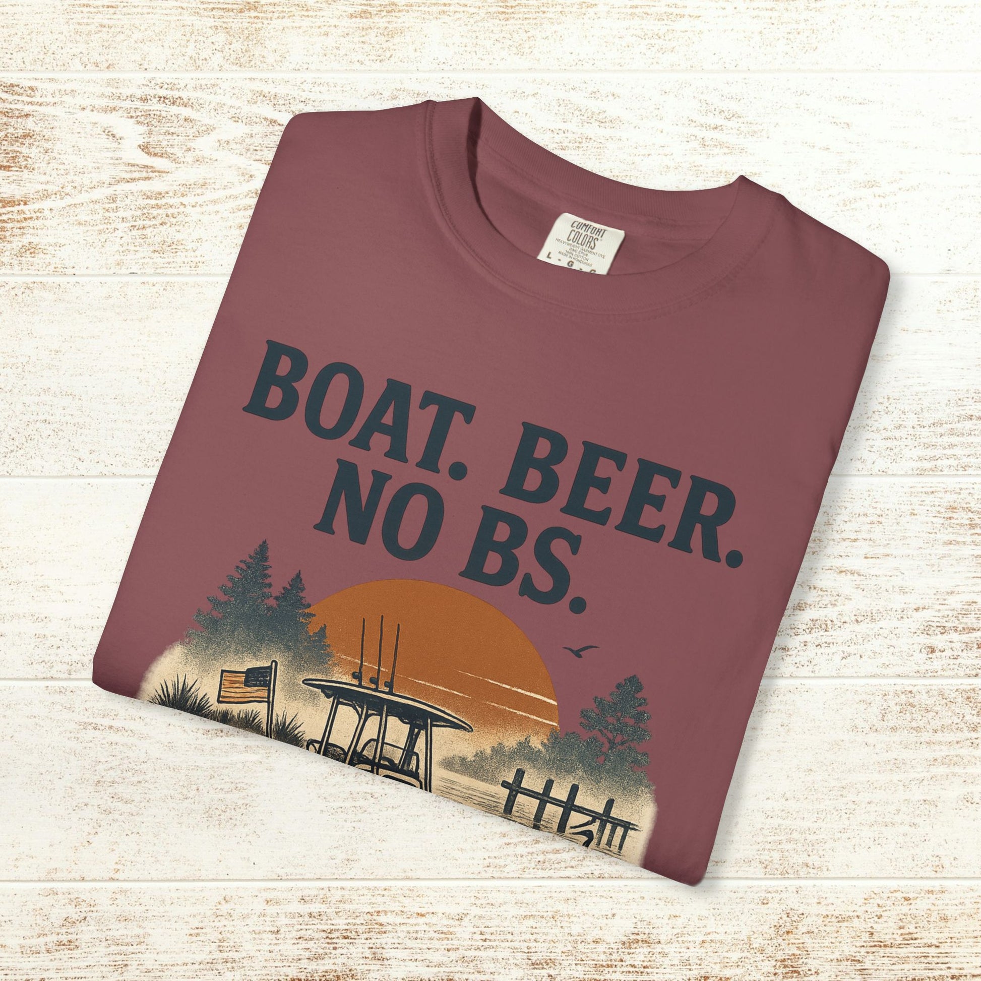 Boat Beer No BS Tee displayed flat, featuring a scenic graphic design with a sunset and forest backdrop.