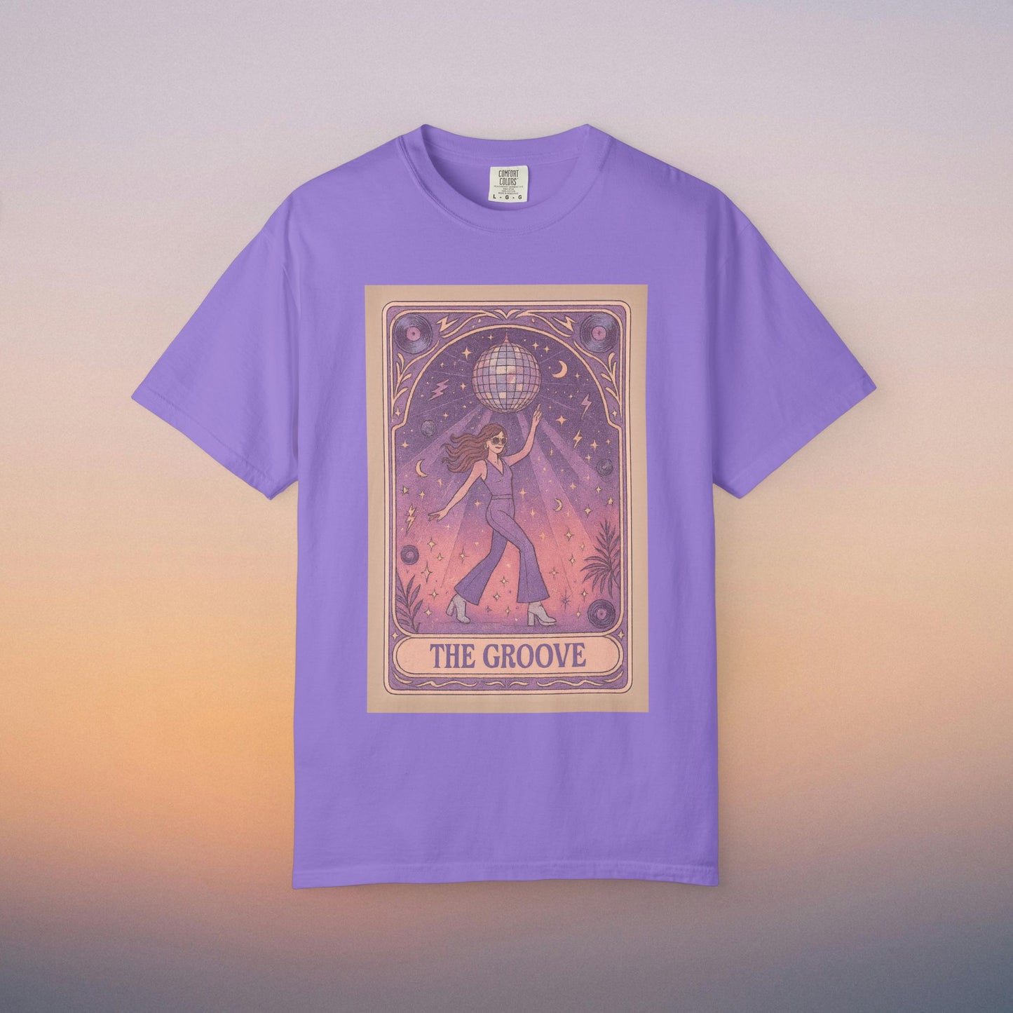 Groove Tarot Graphic Tee in lavender, showcasing a unique design featuring a figure with a disco ball, available in unisex fit, made of 100% ring-spun cotton, perfect for casual wear.