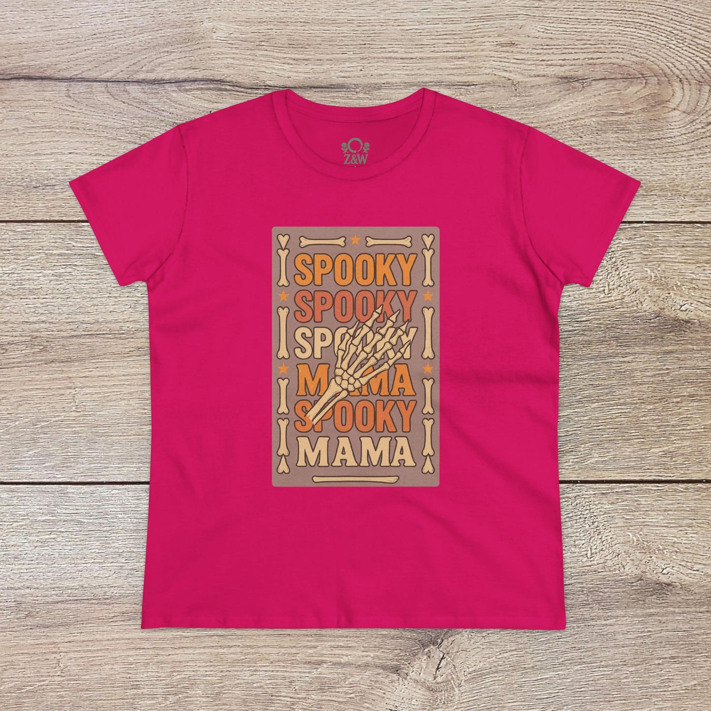 Spooky Mama Tee in bright magenta with an eye-catching skeleton hand graphic, crafted from durable soft cotton perfect for spooky season.