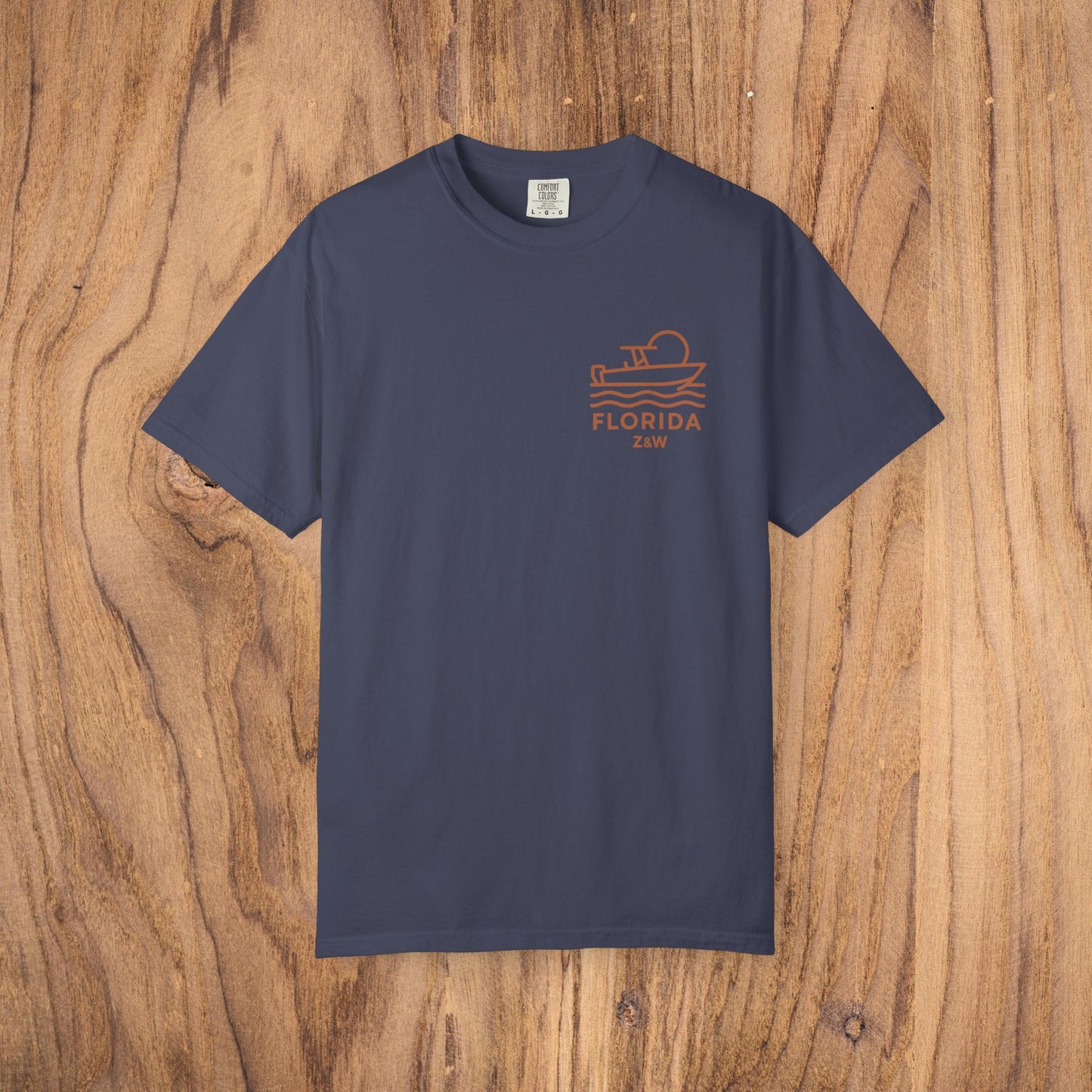 Unisex Florida Graphic Tee in navy blue, garment-dyed for unique texture, crafted from soft US cotton, available in sizes S to 4XL, ideal for casual wear.