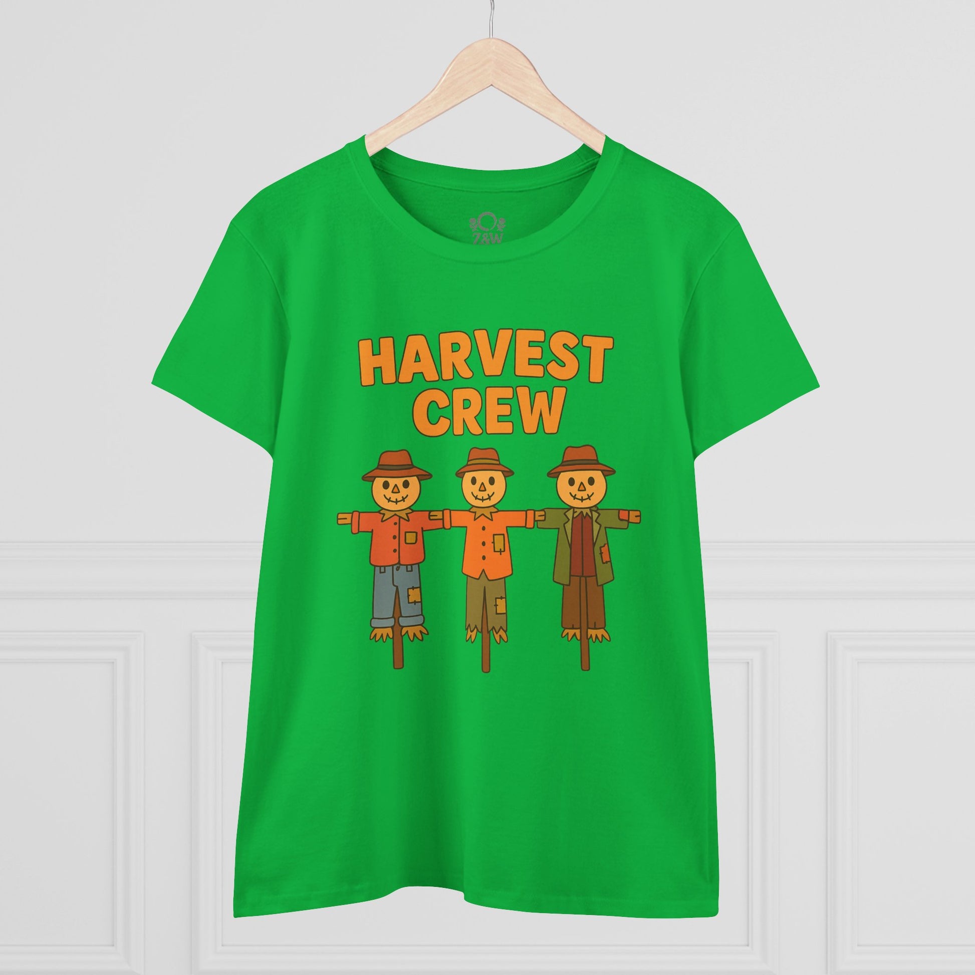 Green Harvest Crew Halloween T-Shirt featuring cheerful scarecrow designs, made from soft 100% ring-spun cotton, ideal for festive occasions.