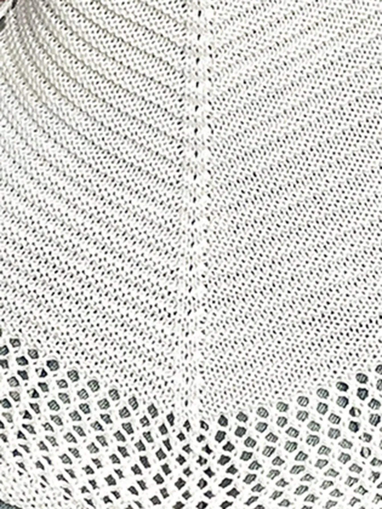 Stylish detail of the Women's Openwork Knit Cami Top featuring a scoop neck design, ideal for layering. Made from 100% polyester, this lightweight and breathable top showcases an intricate openwork knit pattern, perfect for warm weather.
