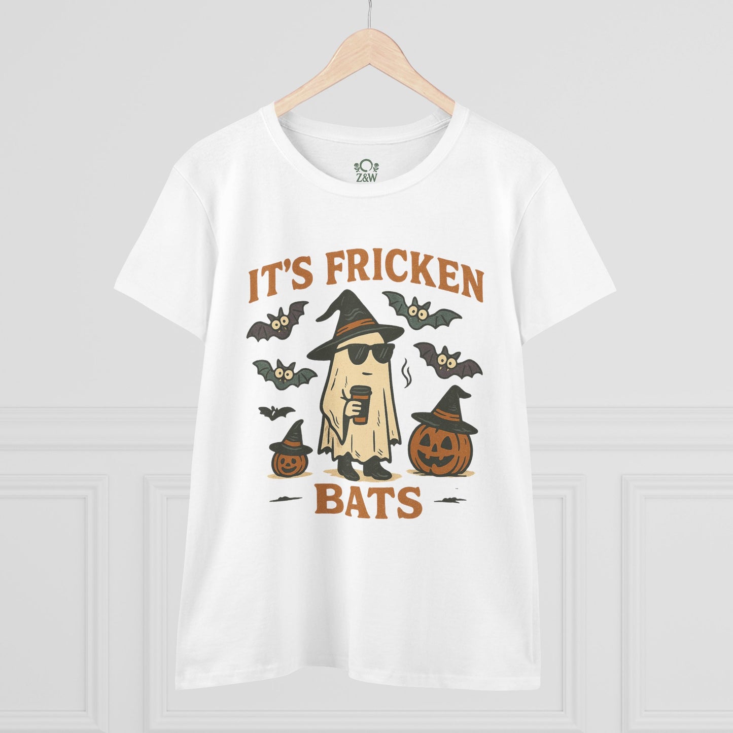 Fun Halloween unisex t-shirt featuring a graphic design of a ghost with sunglasses, bats, and pumpkins, perfect for trick-or-treating. Made from 100% cotton.