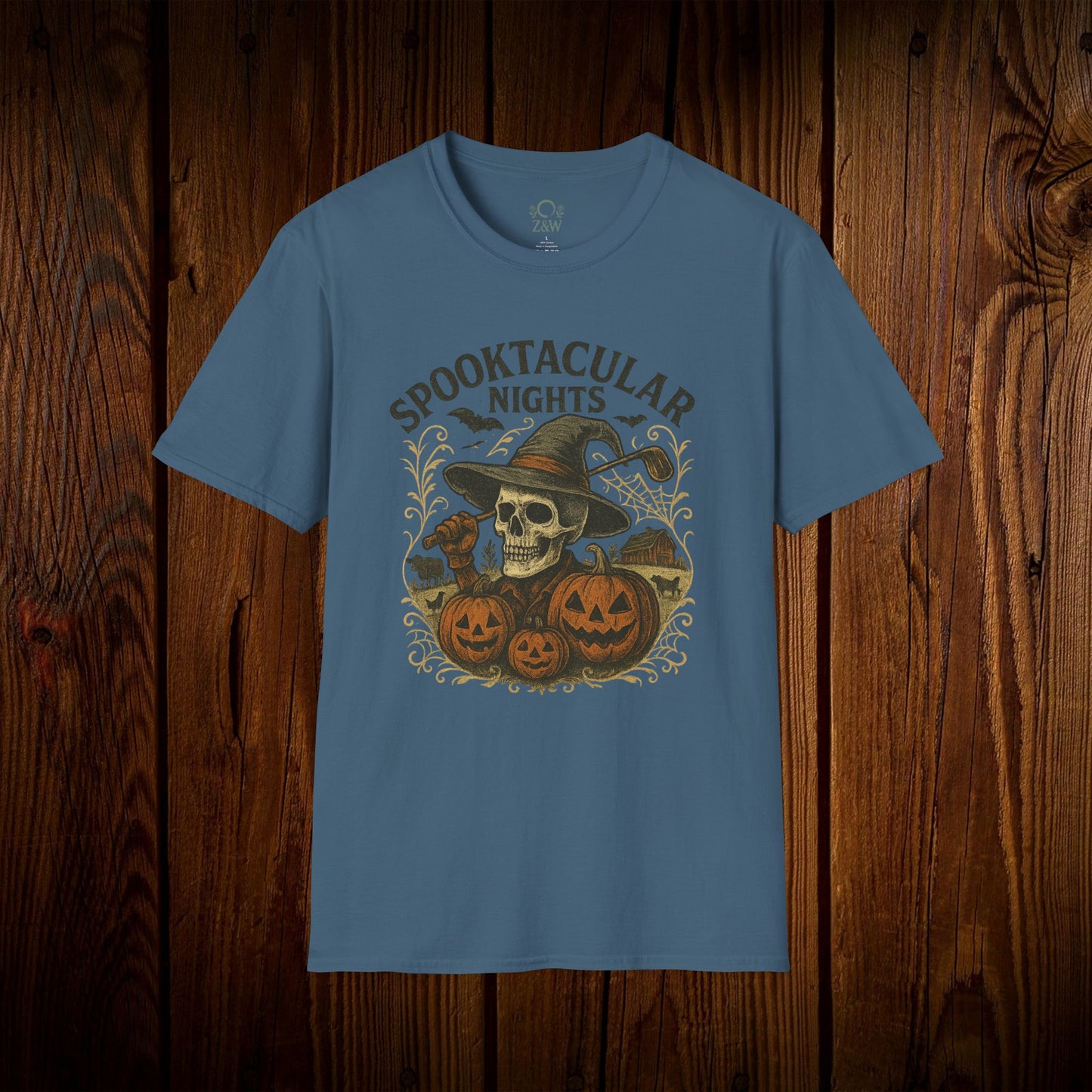 Spooktacular Nights Halloween T-Shirt for Unisex showcasing a vibrant skull and pumpkin graphic on a darker blue fabric, a must-have for fall party costumes.