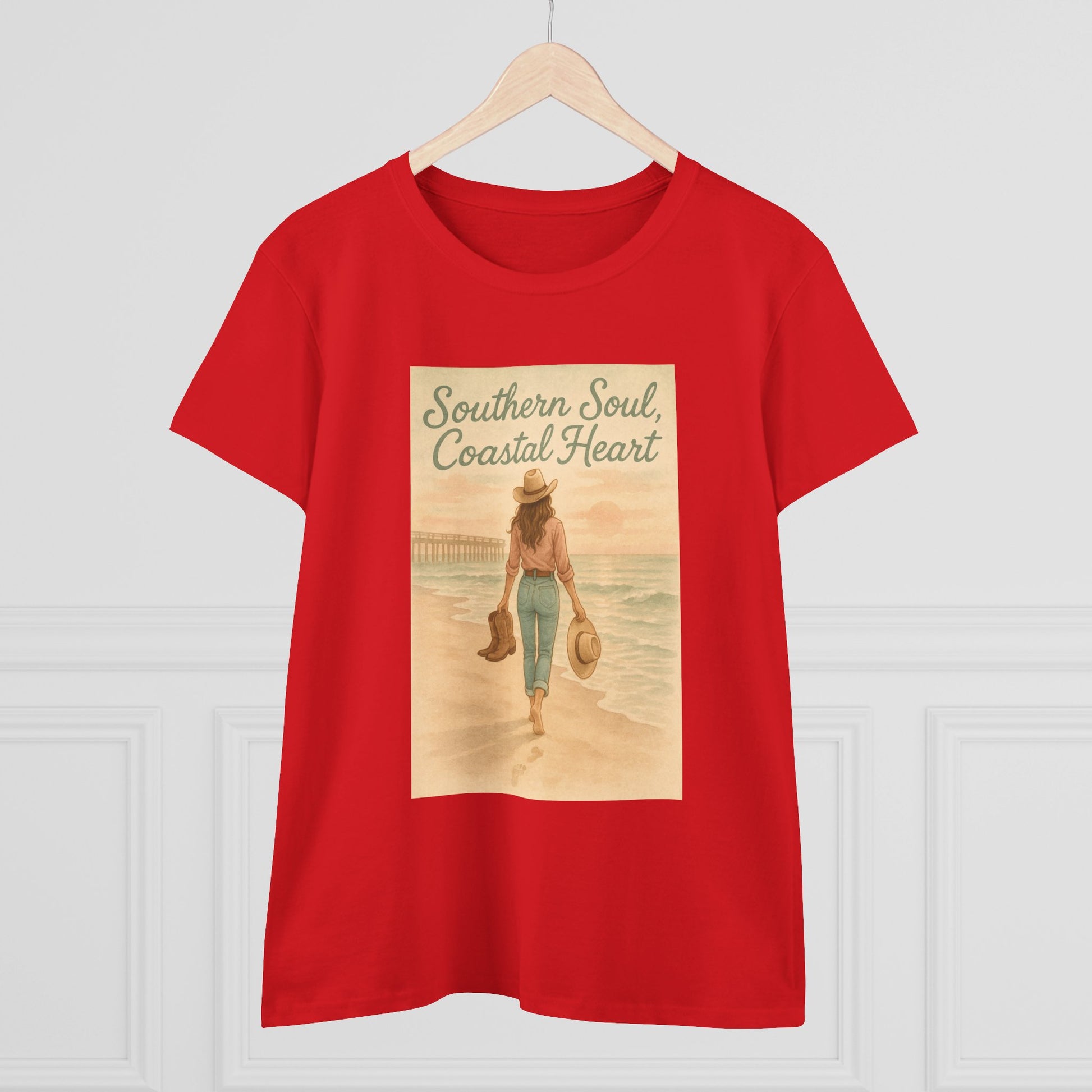 Southern Soul Coated Heart Tee in red, hanging against a white background, featuring a beautiful graphic print of a woman on the beach. A comfortable and fashionable choice for summer outings.