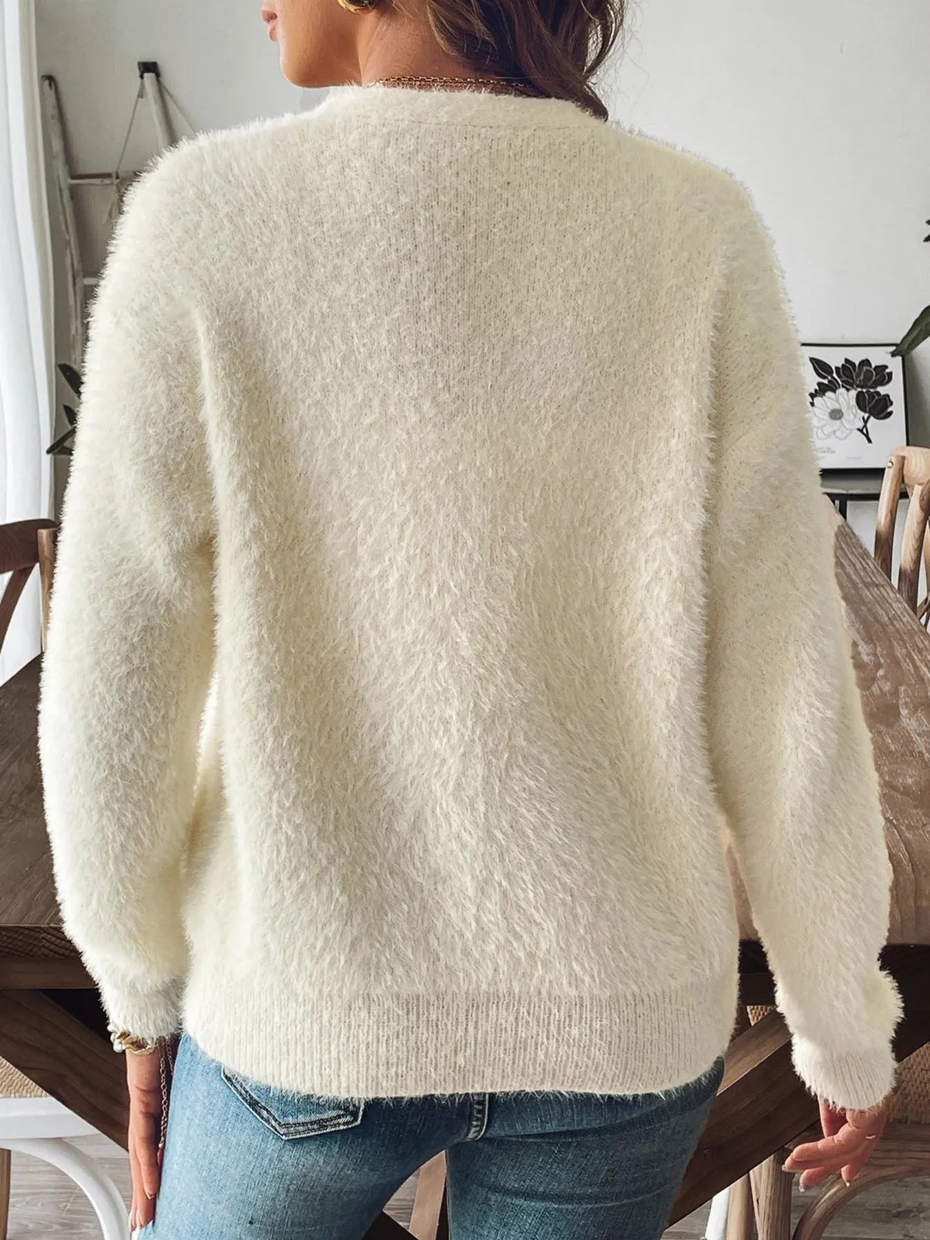 Back view of the Trendsi Fuzzy Button-Front Cardigan highlighting the plush texture and cozy fit, made from 100% polyester.