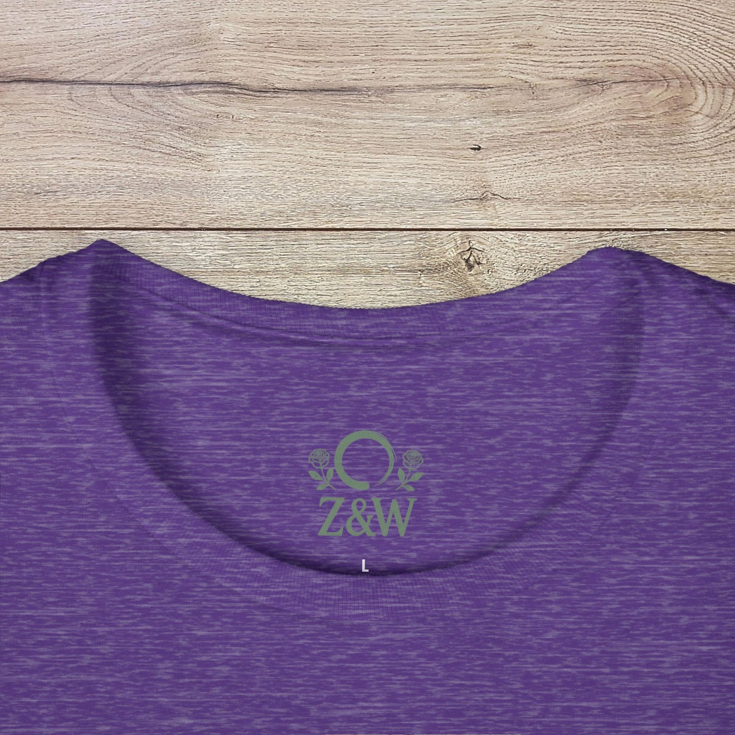 Close-up of Under-Caffeinated Over-Stimulated Hoodie featuring a vibrant purple fabric and an embroidered design, showcasing the adjustable drawstring for a perfect fit.