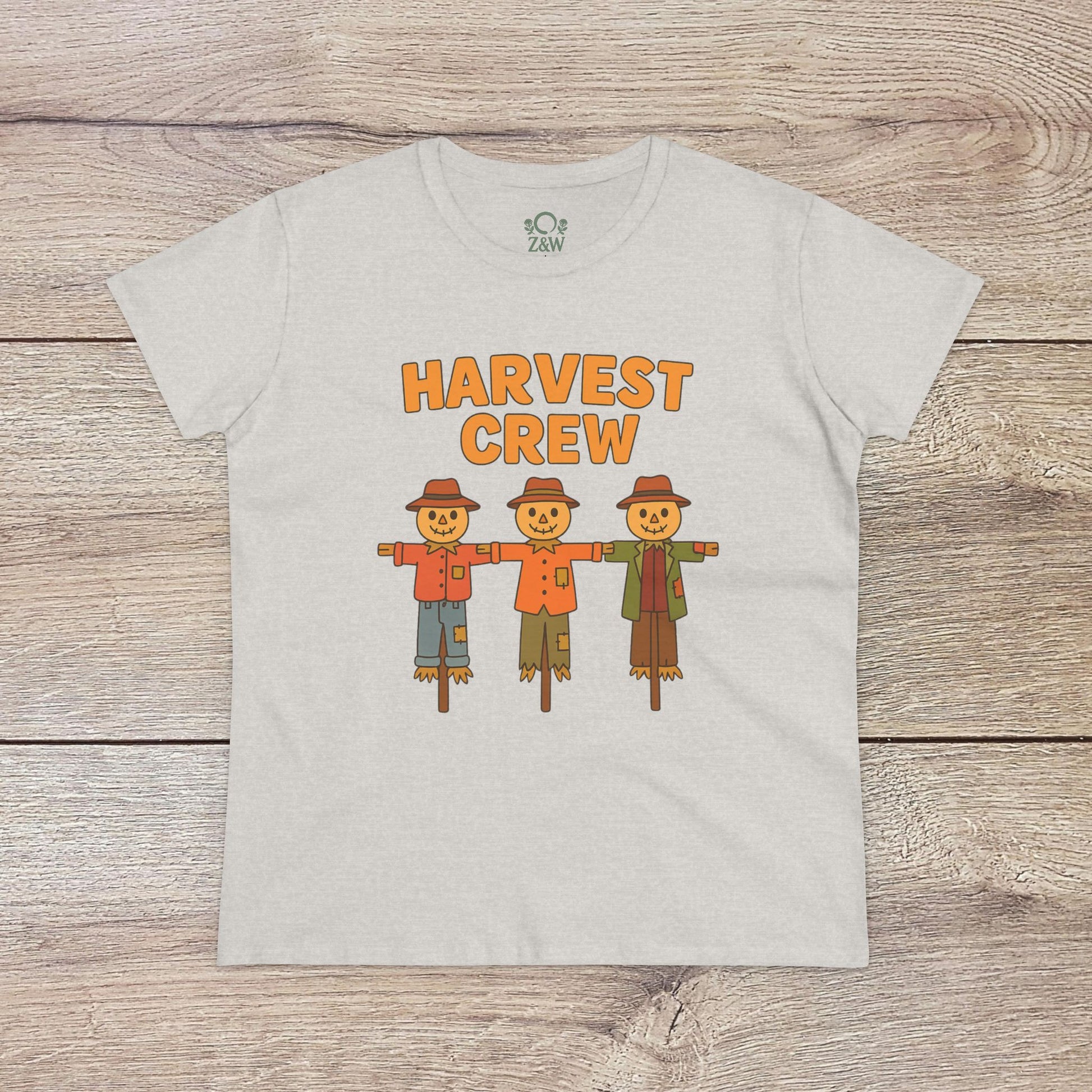 Harvest Crew Halloween T-Shirt in light gray showcasing three cheerful scarecrows, ideal for a casual yet festive look. Crafted from soft 100% ring-spun cotton.