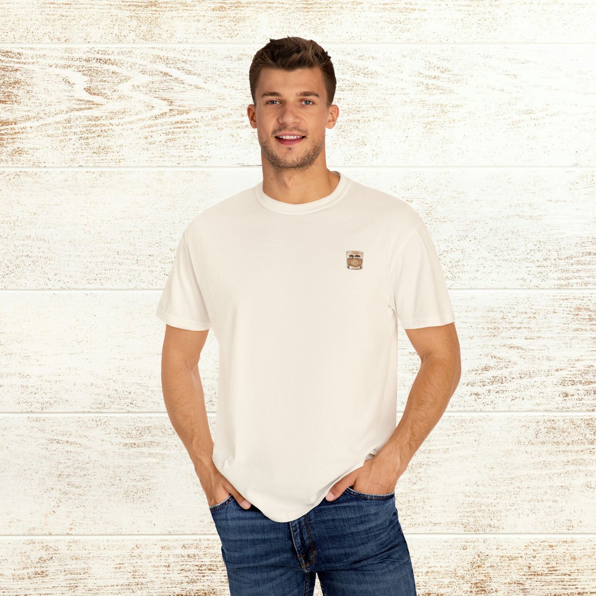 Rodeo On The Rocks Tee - A man smiling in a white t-shirt highlighting its soft fabric and comfortable fit, available in sizes S to 4XL.