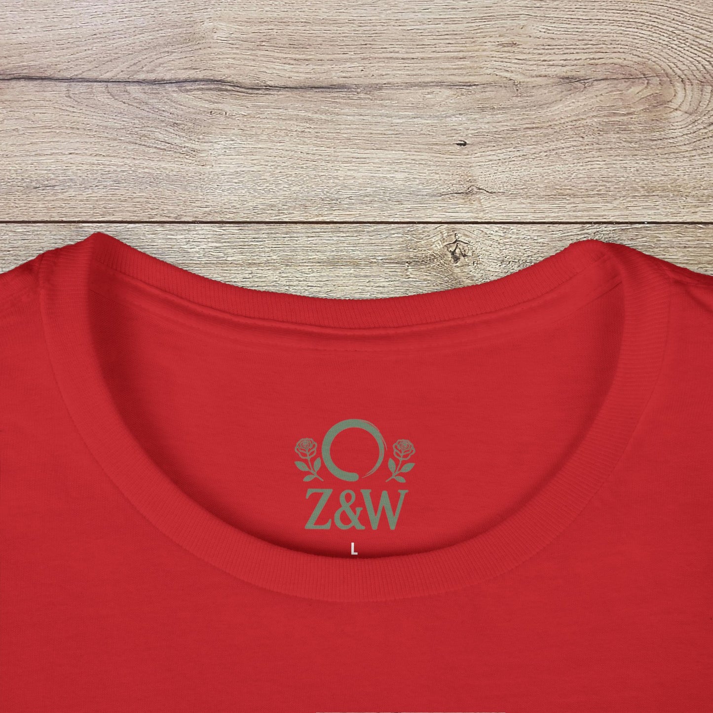 Close-up of the neckline of a red funny Pilates t-shirt with durable shoulder tape, emphasizing comfort and classic fit for any occasion.