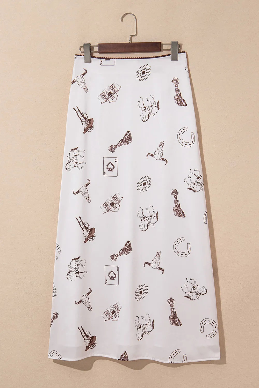 Trendsi Western Print Satin Long Skirt displayed flat, highlighting its unique western prints and elegant flow.