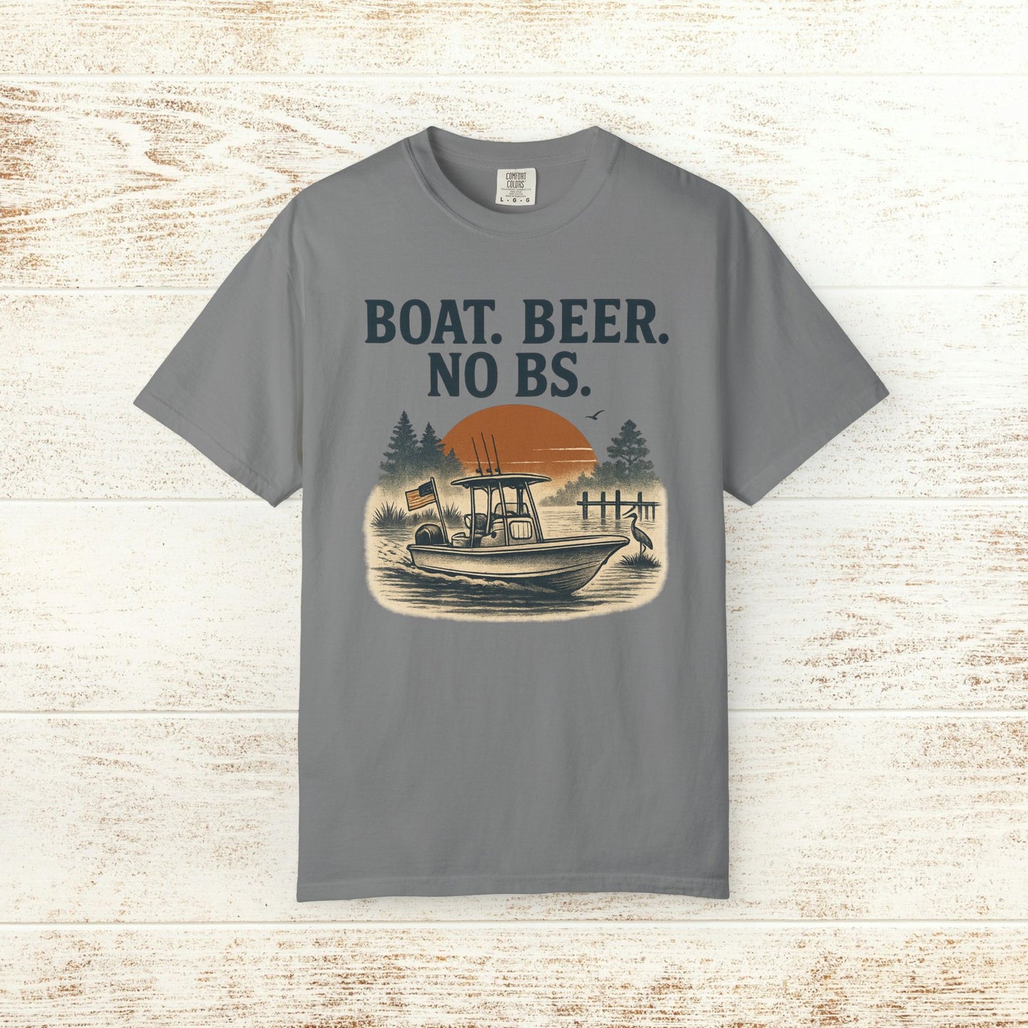 Boat Beer No BS Tee in charcoal gray, displaying a scenic boat design against a sunset background with the words 'BOAT. BEER. NO BS.', perfect for casual gatherings.