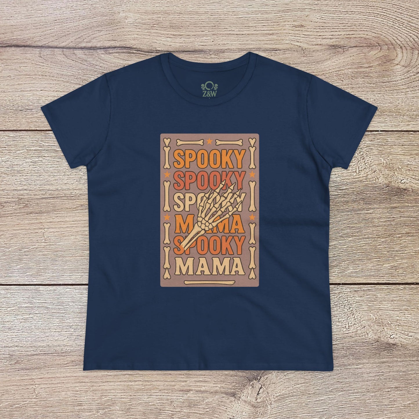 Spooky Mama Tee in navy blue featuring a Halloween-themed design with skeleton hand graphics, made from soft cotton for a comfortable fit.