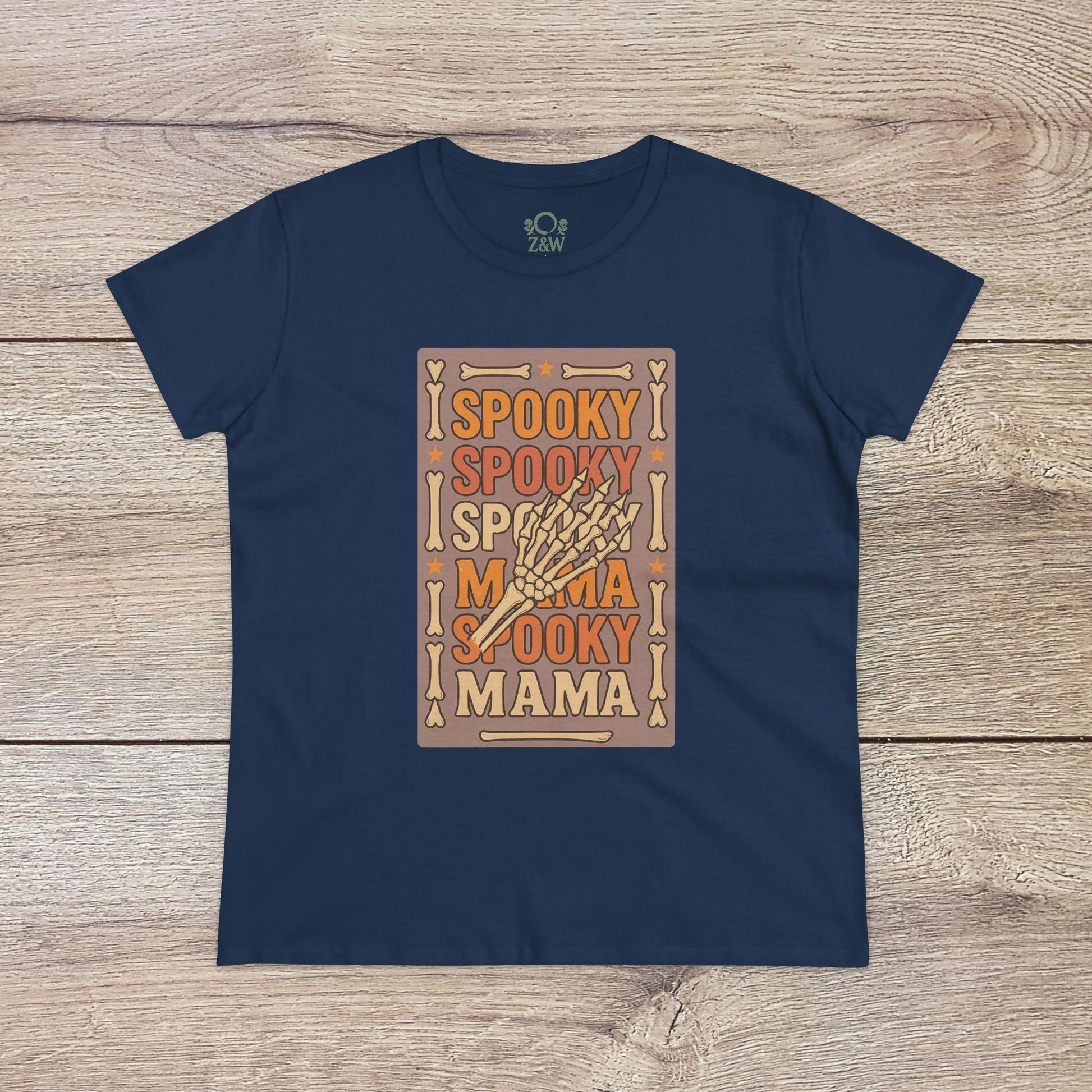 Spooky Mama Tee in navy blue featuring a Halloween-themed design with skeleton hand graphics, made from soft cotton for a comfortable fit.