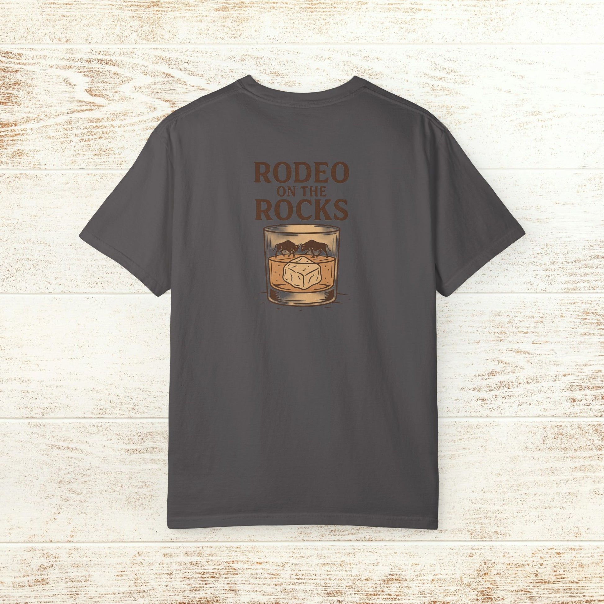 Back view of the Rodeo On The Rocks Tee, displaying a whiskey glass graphic and the text 'RODEO ON THE ROCKS'.