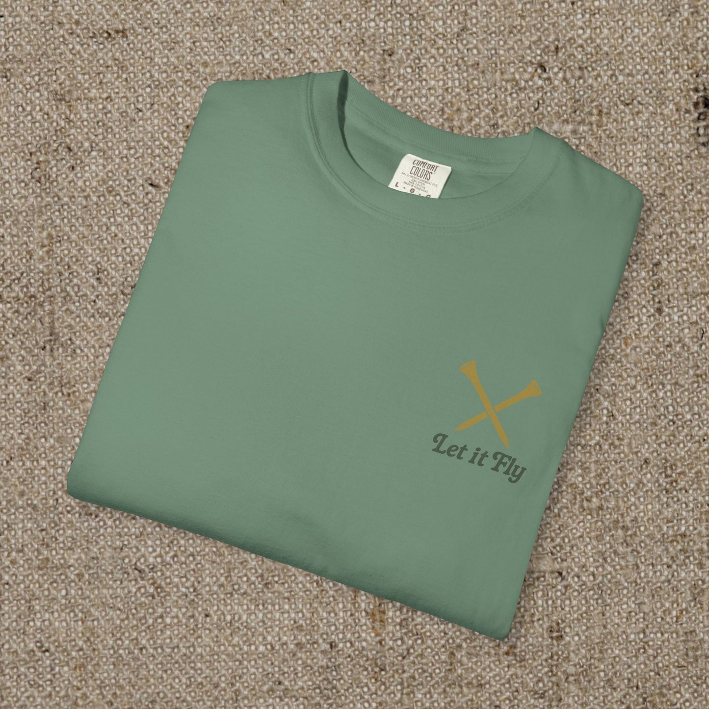 Folded 'Tee It High Let It Fly Graphic Tee' showcasing its soft fabric and minimalistic design, ideal for casual wear.