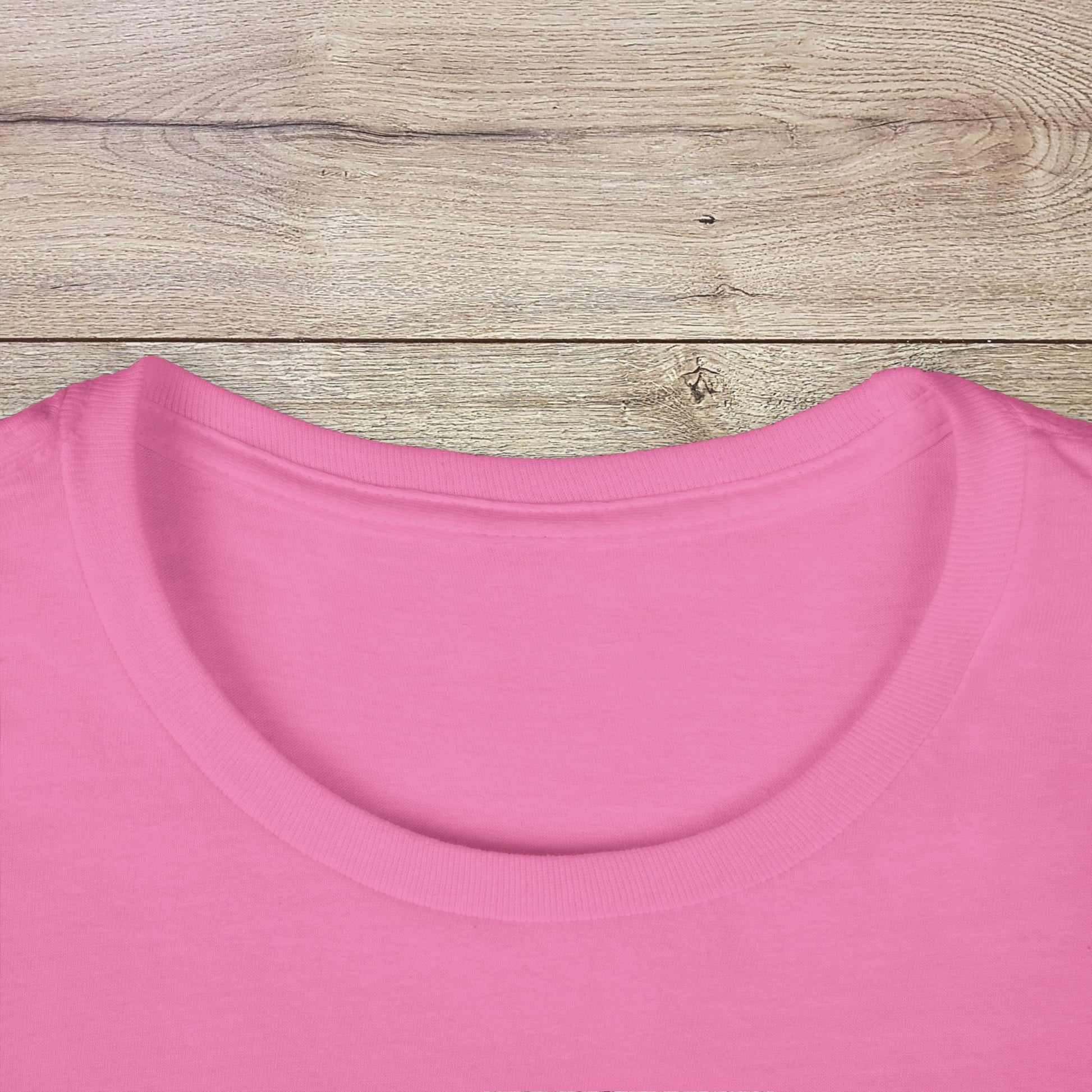 Close-up of the neckline of the pink Golf Wives Social Club Tee, featuring the soft texture and high-quality, ethically produced materials.