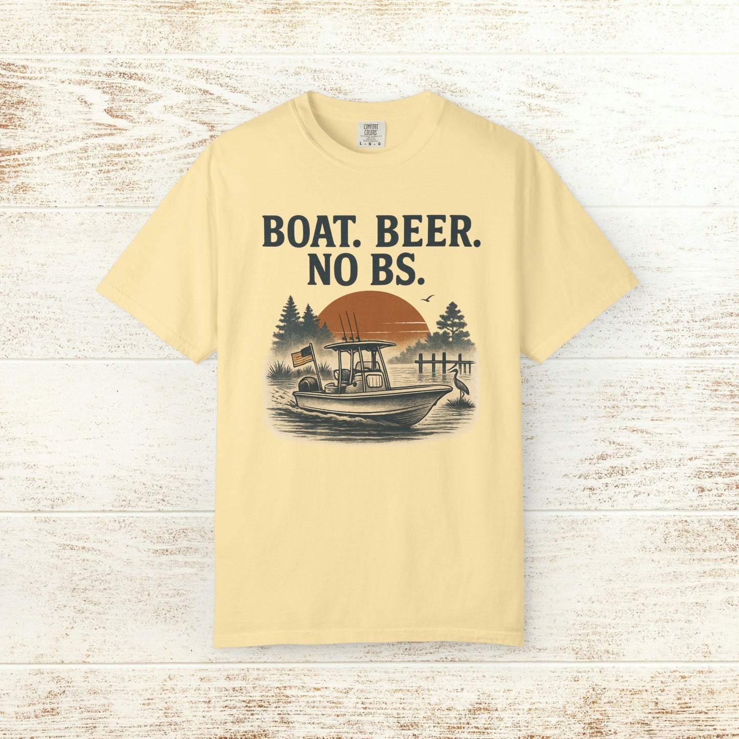 Boat Beer No BS Tee in light yellow featuring a graphic of a fishing boat with a sunset backdrop, perfect for casual outings and boat lovers.