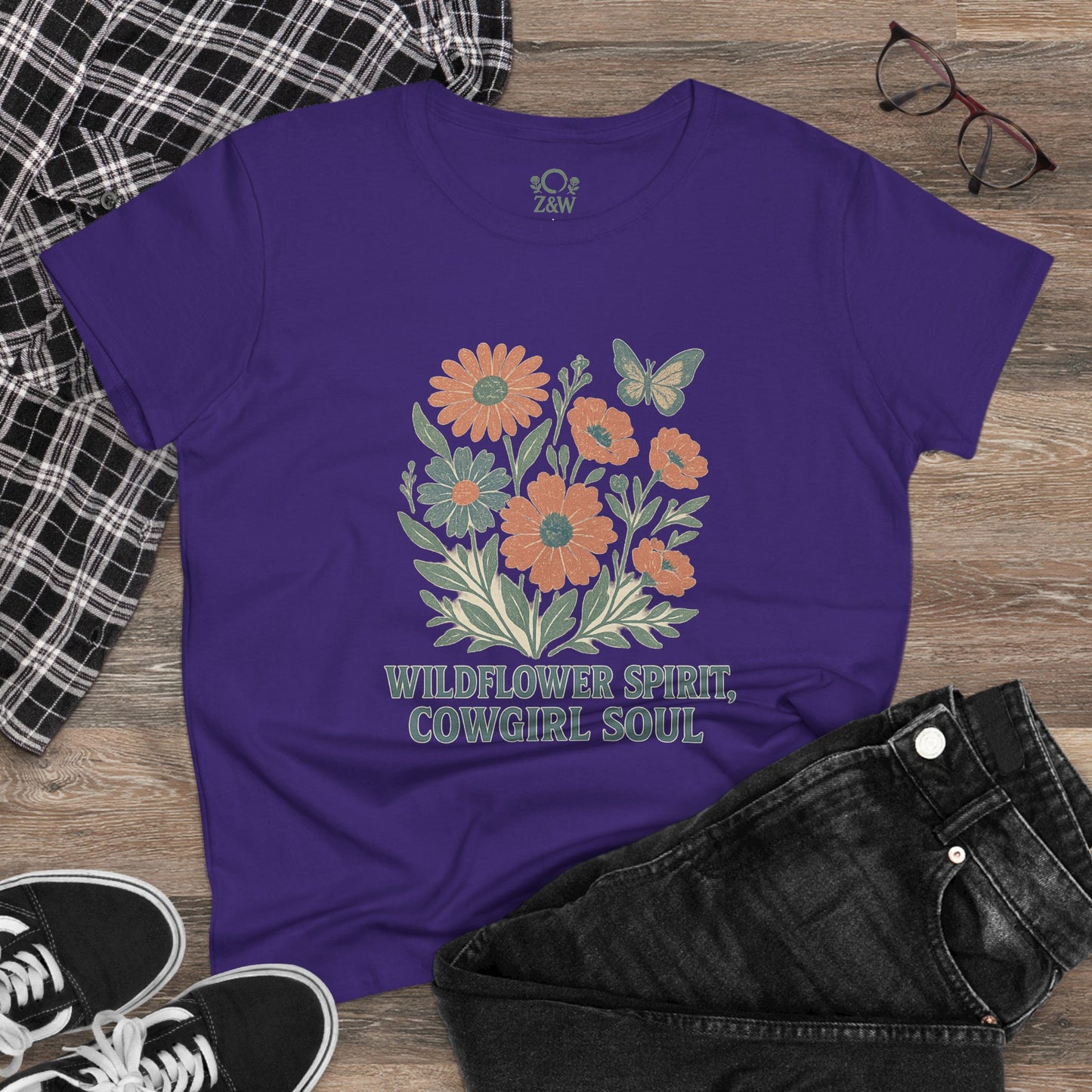 Wildflower Spirit Cotton Tee in purple, showcasing a vibrant floral design along with a butterfly, perfect for casual wear.